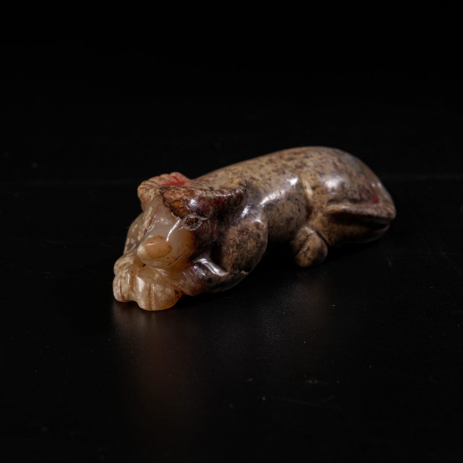 A ANCIENT JADE RECUMBENT OX ORNAMENT: Ancient Jade Recumbent Ox Ornament