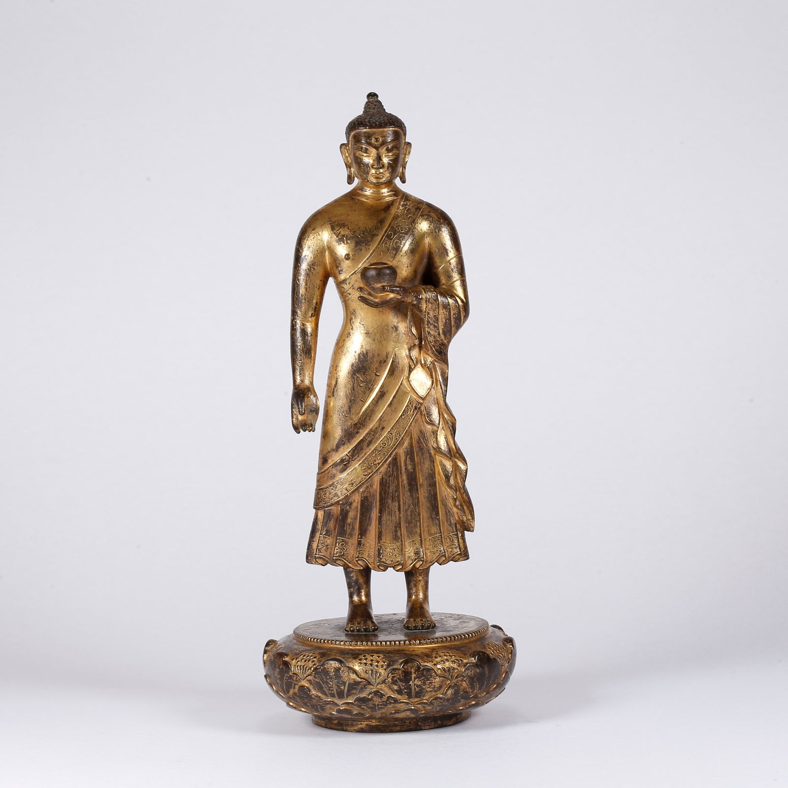 A GILT BRONZE MEDICINE BUDDHA STATUE: Gilt Bronze Medicine Buddha Statue