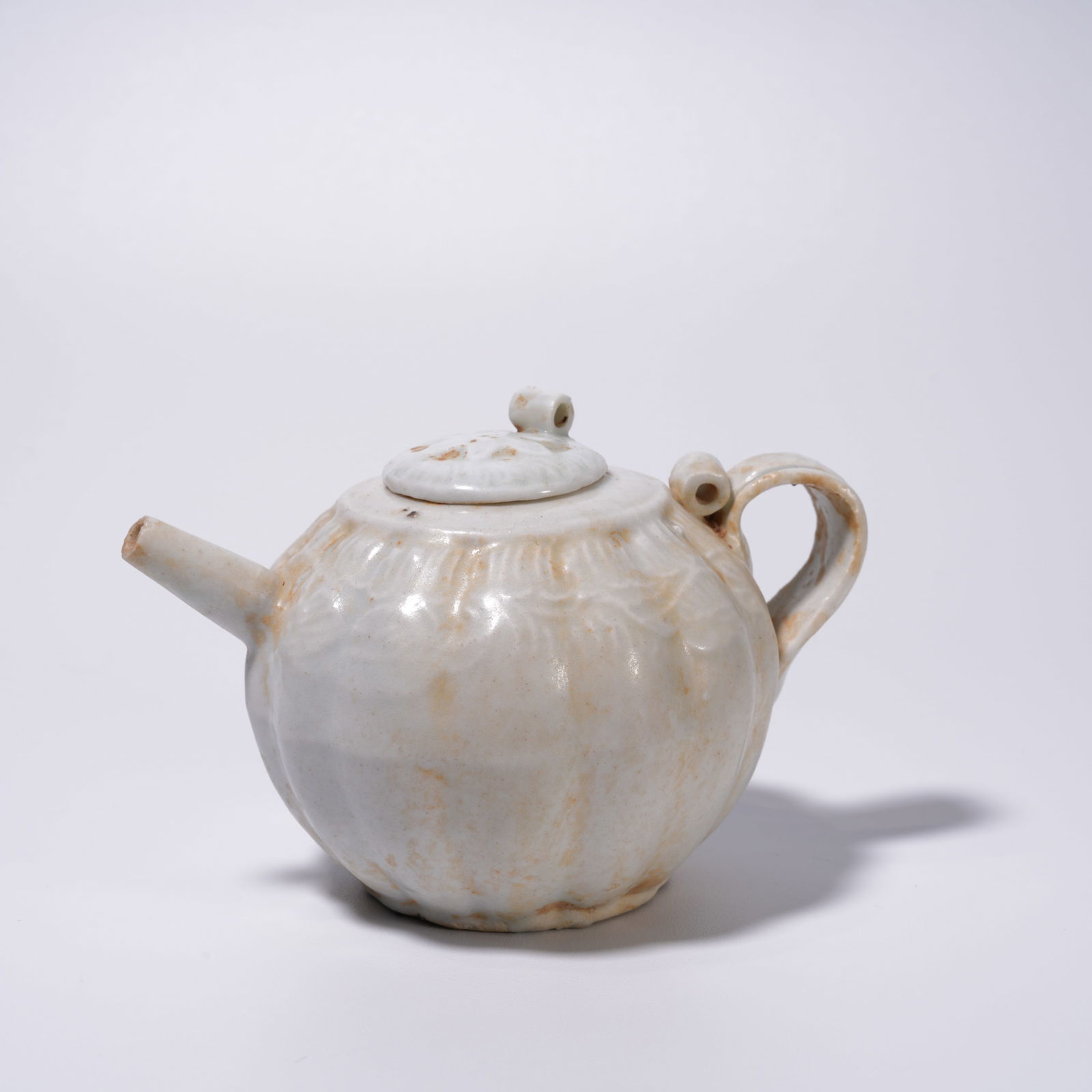 A DING WARE EWER: Ding ware ewer