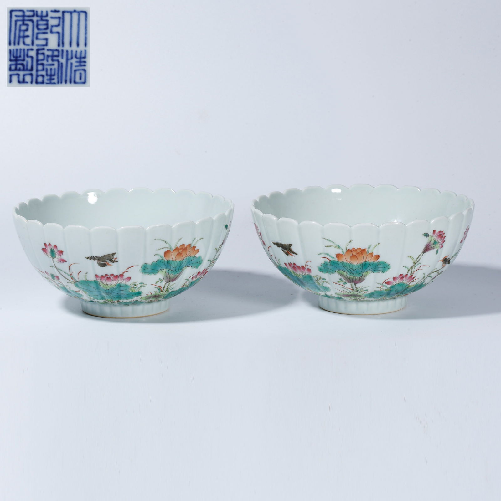 A FAMILLE ROSE FLOWER-AND-BIRD BOWL (PAIR): Famille Rose Flower-and-Bird Bowl (Pair)