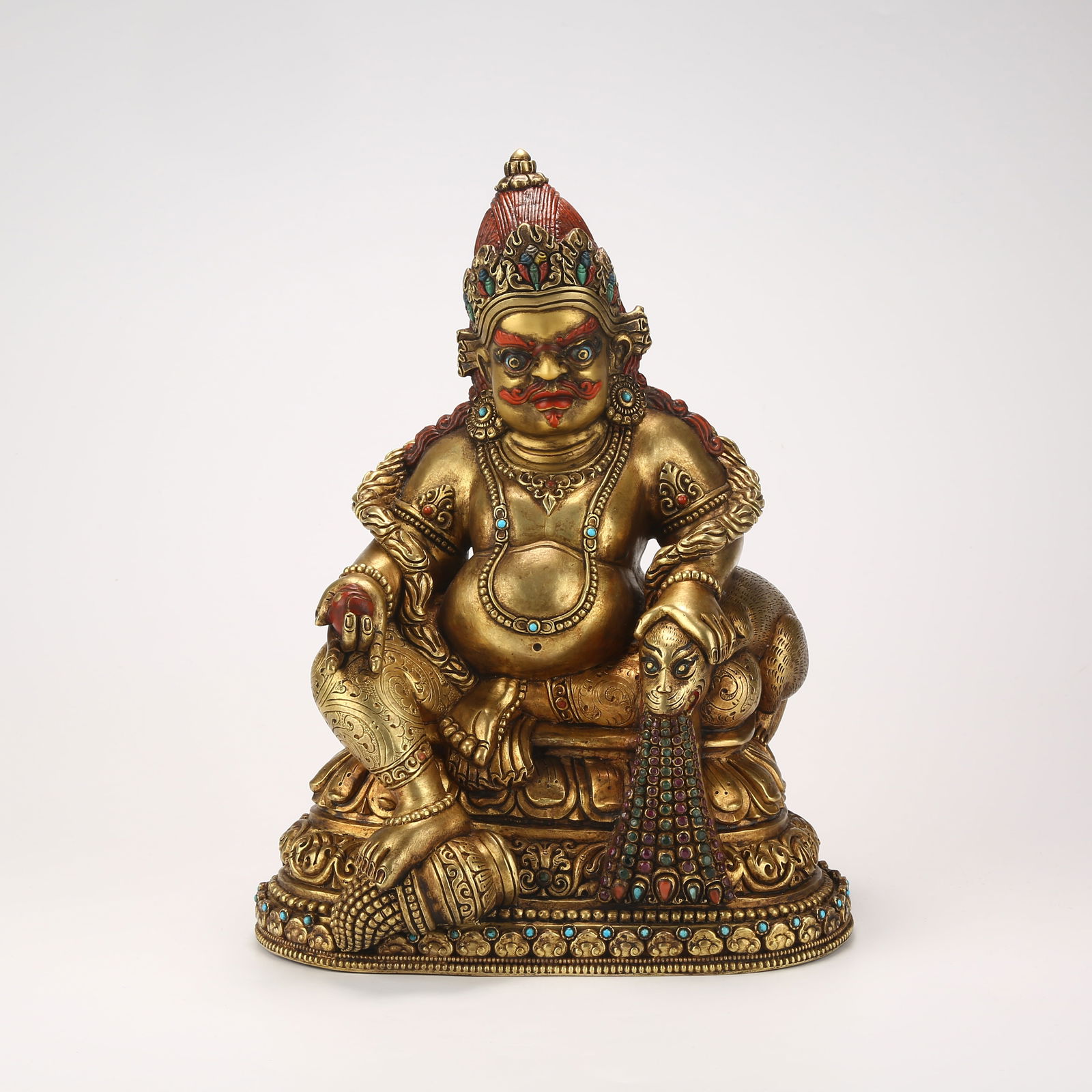 A GILT BRONZE FIGURE OF YELLOW JAMBHALA (1 of 9)