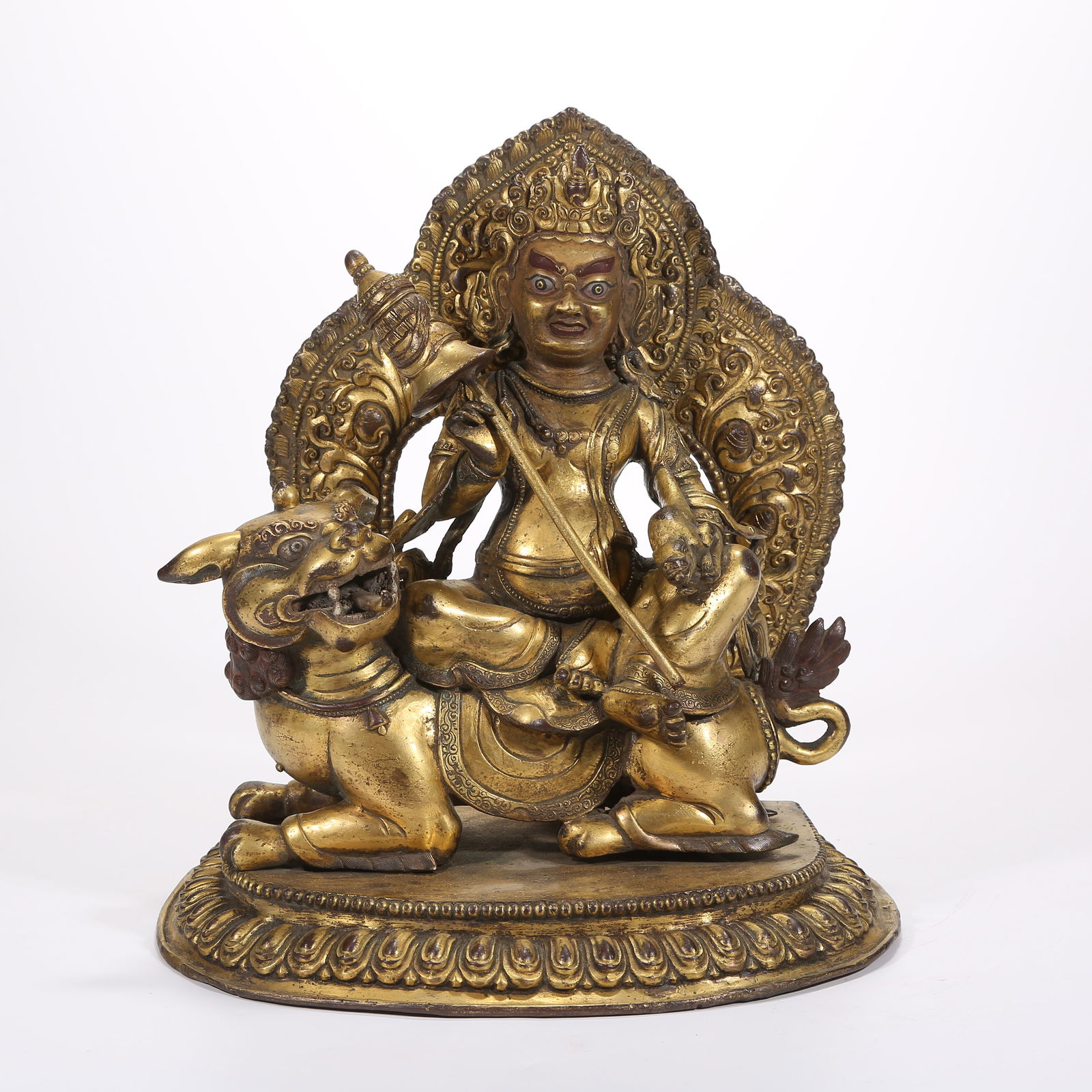 A GILT-BRONZE STATUE OF VAISRAVANA (GUARDIAN KING OF WEALTH): Gilt-Bronze Statue of Vaisravana (Guardian King of Wealth)