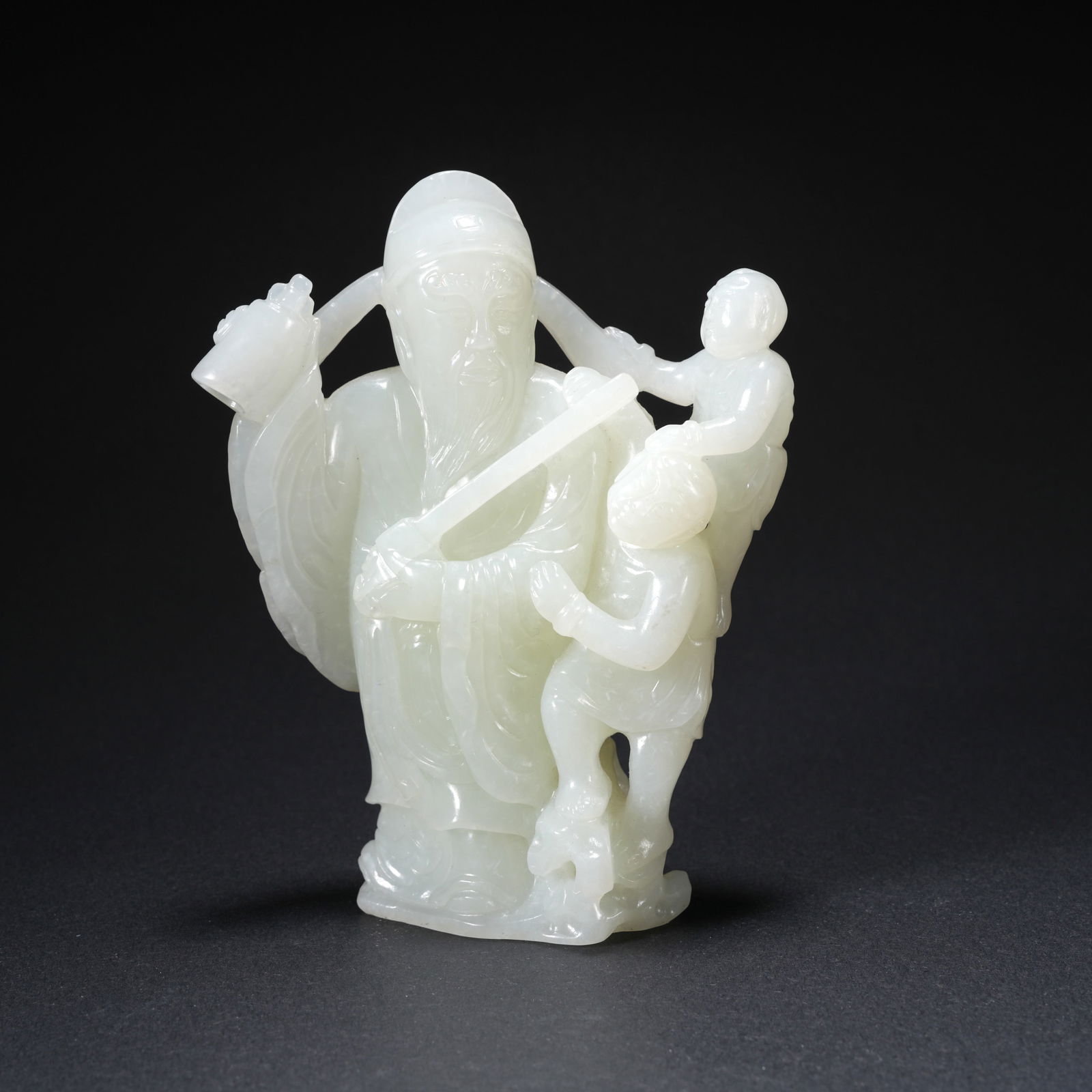 A HETIAN JADE CARVED FIGURAL FIGURE (1 of 9)