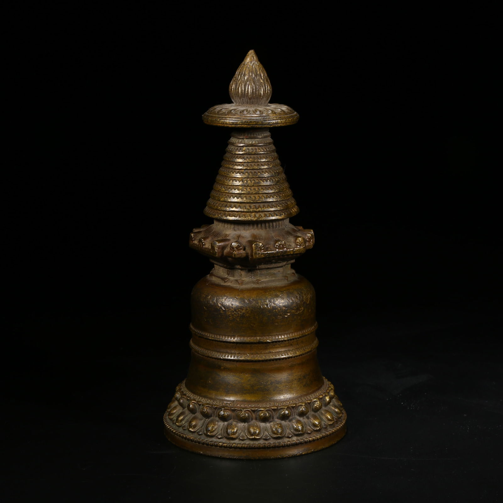 A BRONZE KADAM STUPA: Bronze Kadam stupa