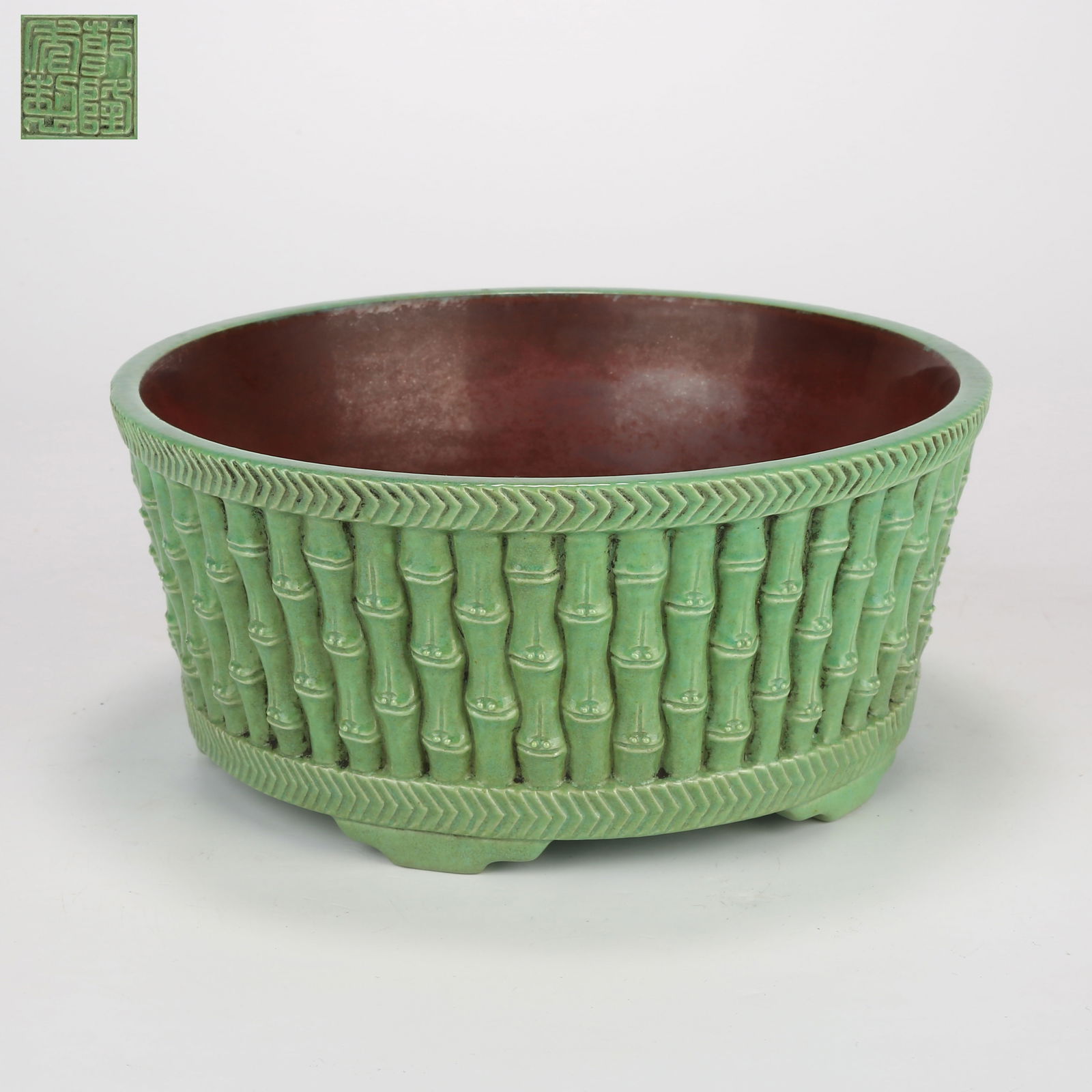 A LIFE-LIKE PORCELAIN GREEN-GLAZED BAMBOO-SHAPED NARCISSUS BASIN: Life-like porcelain green-glazed bamboo-shaped narcissus basin