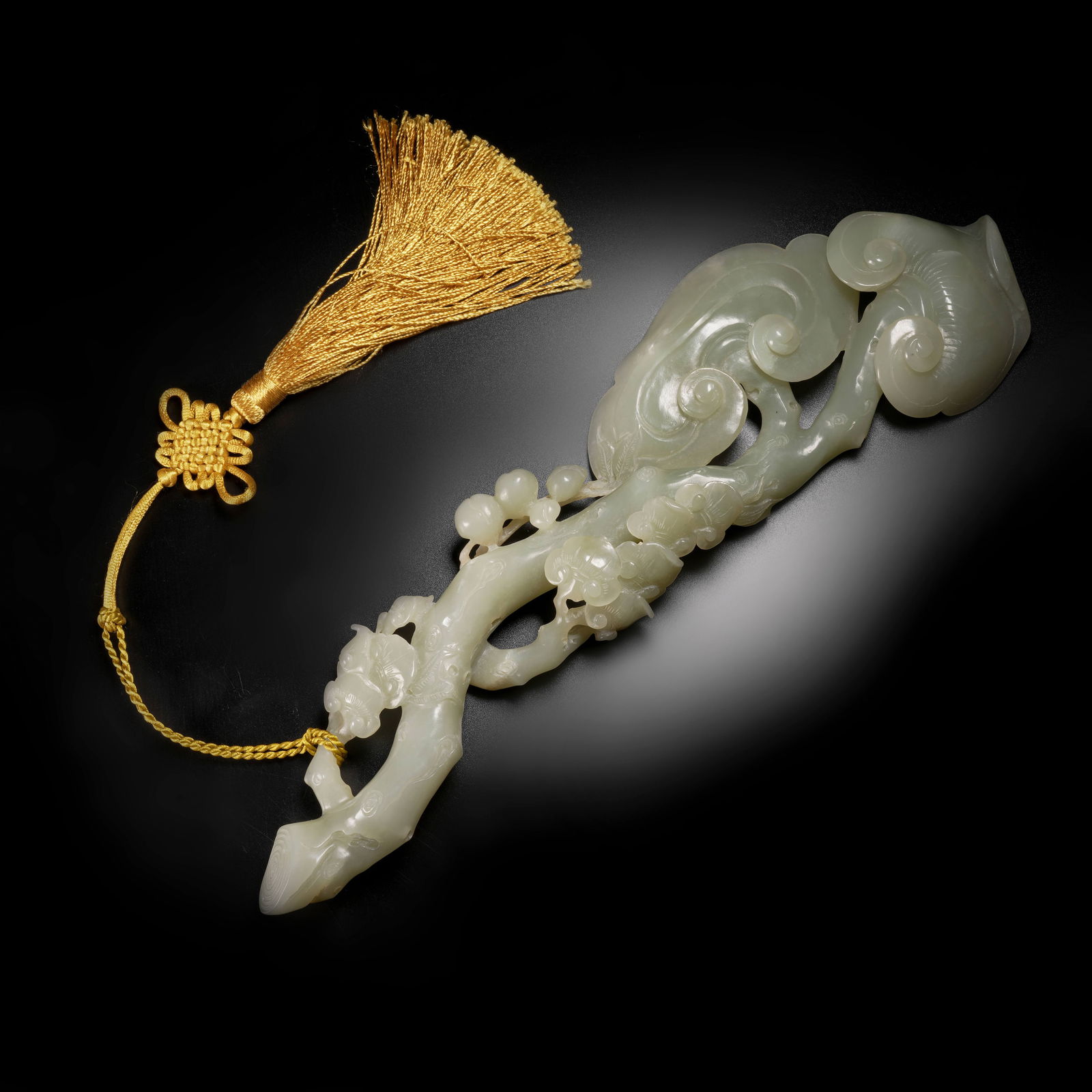 A HETIAN JADE LINGZHI-SHAPED RUYI SCEPTER: Hetian Jade Lingzhi-Shaped Ruyi Scepter