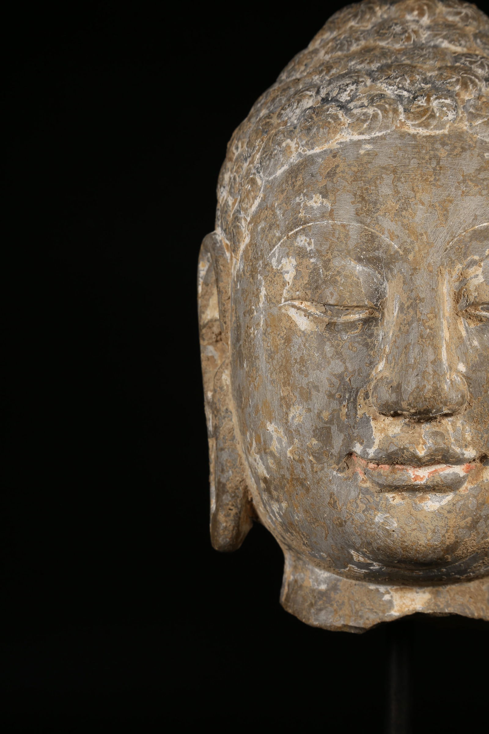 A BLUESTONE BUDDHA HEAD - 2