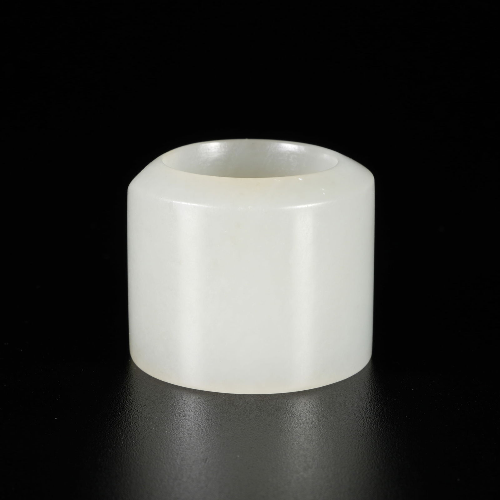 A CARVED HETIAN JADE THUMB RING (1 of 9)