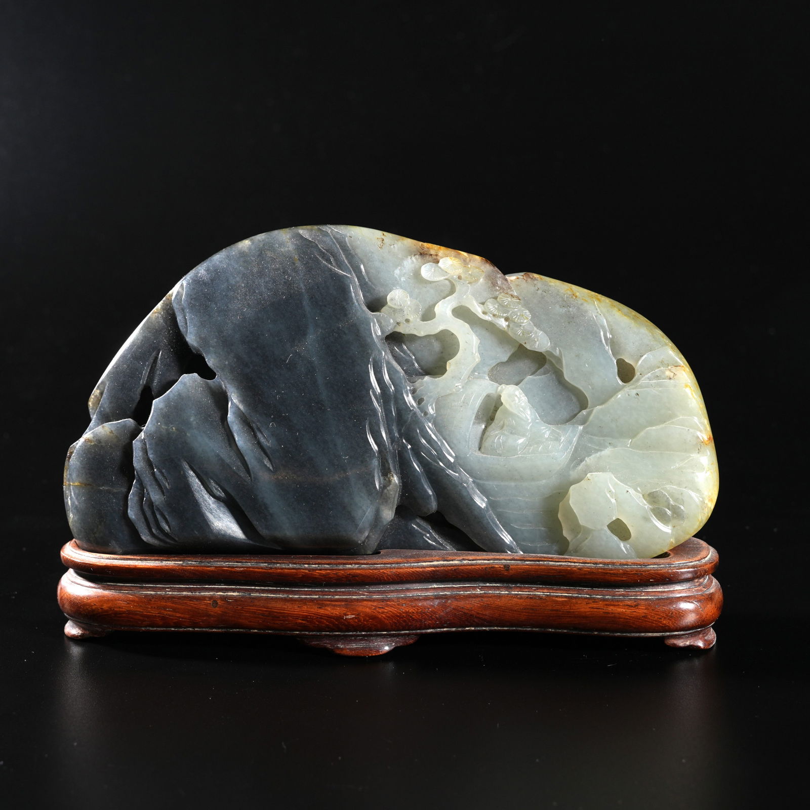 A HETIAN JADE CLEVERLY CARVED MOUNTAIN-FORM ORNAMENT: Hetian Jade Cleverly Carved Mountain-Form Ornament