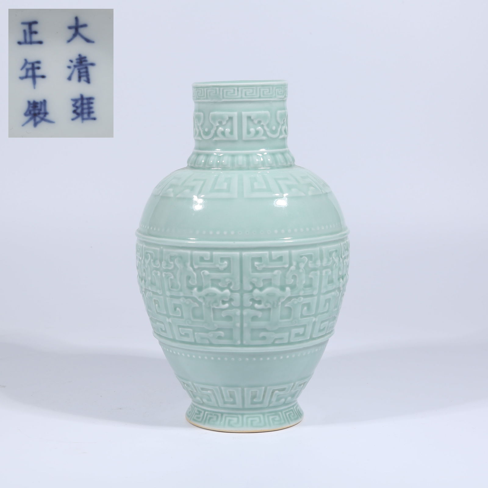A CELADON-GLAZED VASE WITH MOLDED KUI DRAGON DESIGN (1 of 9)
