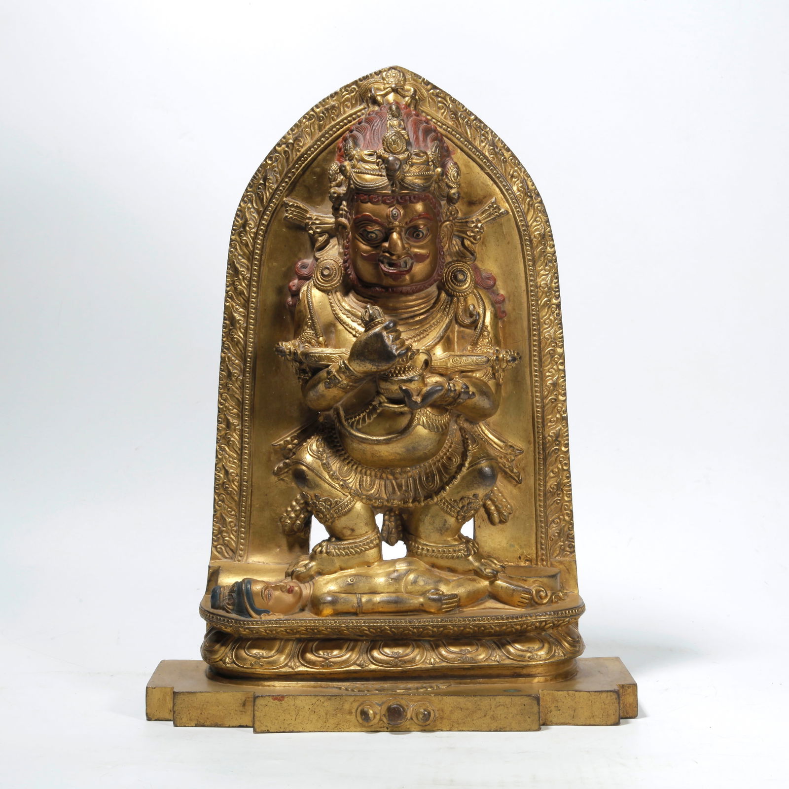 A GILT BRONZE TWO-ARMED MAHAKALA STATUE: Gilt Bronze Two-Armed Mahakala Statue