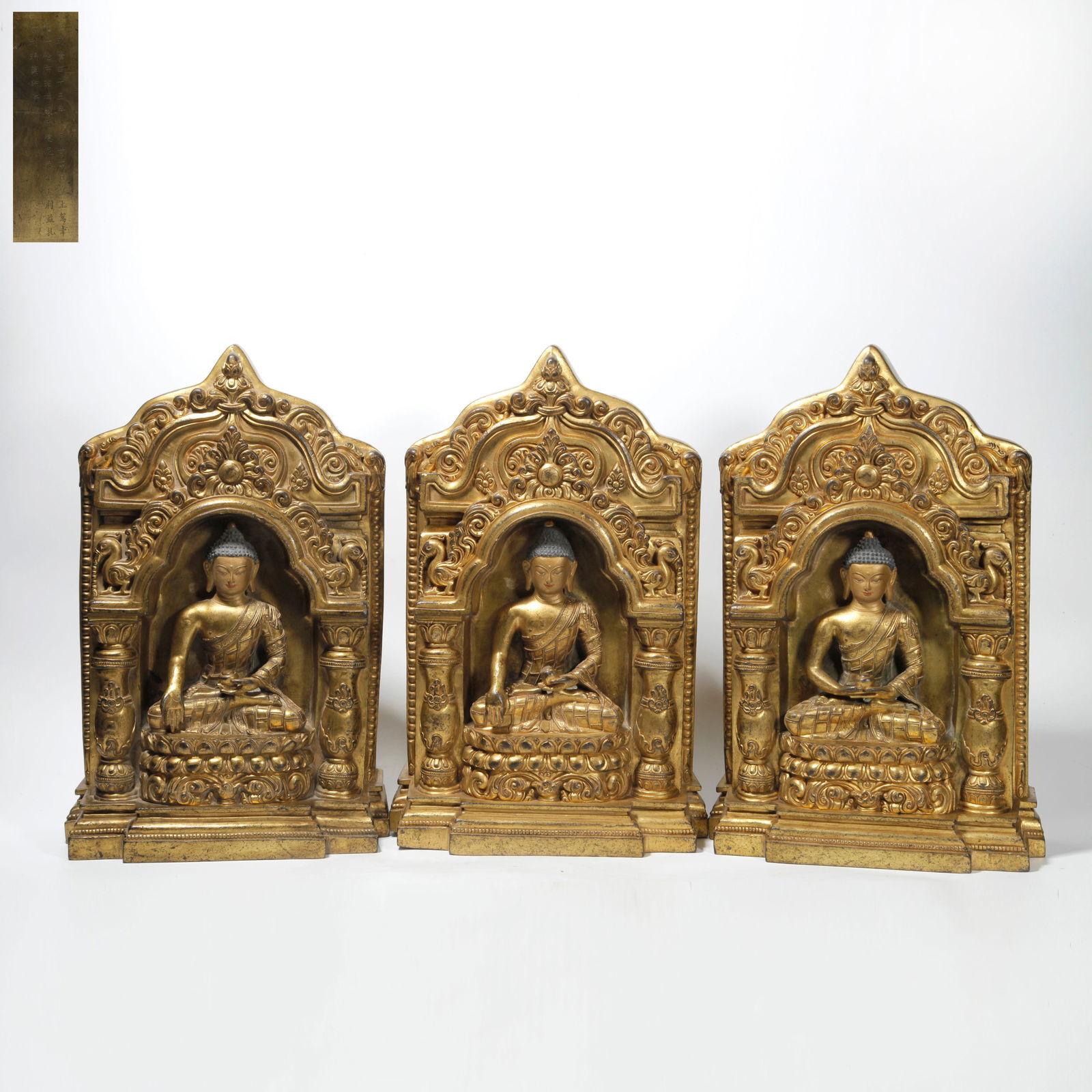 A GILT BRONZE SHAKYAMUNI STATUE SET: Gilt Bronze Shakyamuni Statue Set