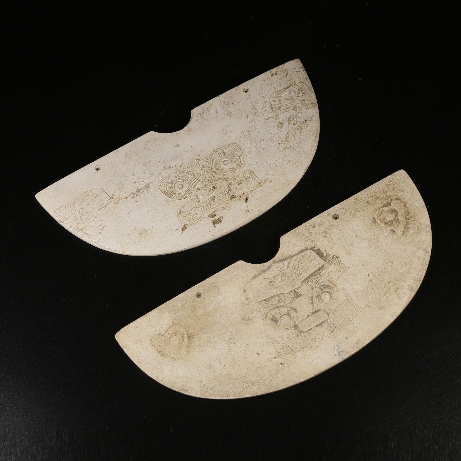 A SET OF ANCIENT JADE LIANGZHU CULTURE ANTHROPOMORPHIC FACE PENDANTS (1 of 9)