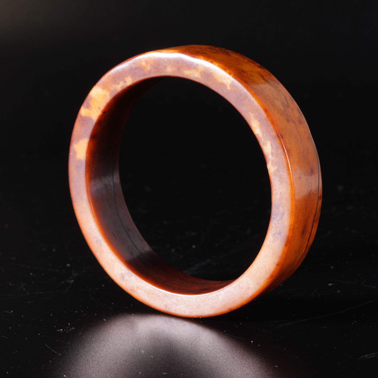 A HETIAN JADE BANGLE: Hetian jade bangle