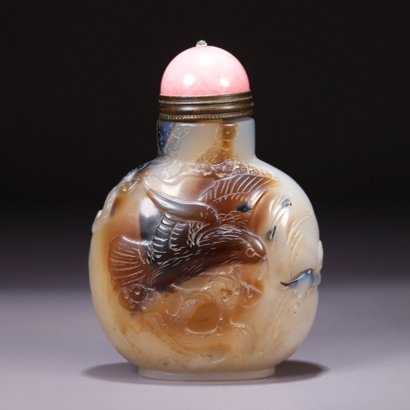 A AGATE SNUFF BOTTLE CARVED WITH EAGLE VIEWING SCENE: Agate Snuff Bottle Carved with Eagle Viewing Scene