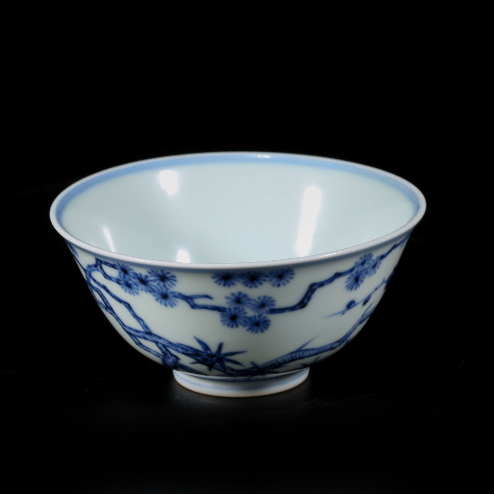 A BLUE-AND-WHITE BOWL WITH "THREE FRIENDS OF WINTER" PATTERN: Blue-and-White Bowl with "Three Friends of Winter" Pattern