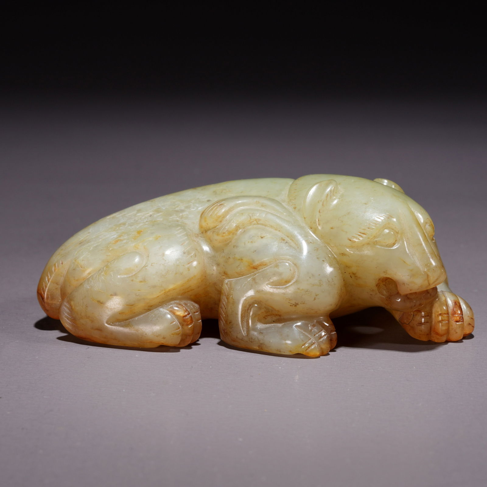A HETIAN JADE BEAST-SHAPED ORNAMENT (1 of 11)