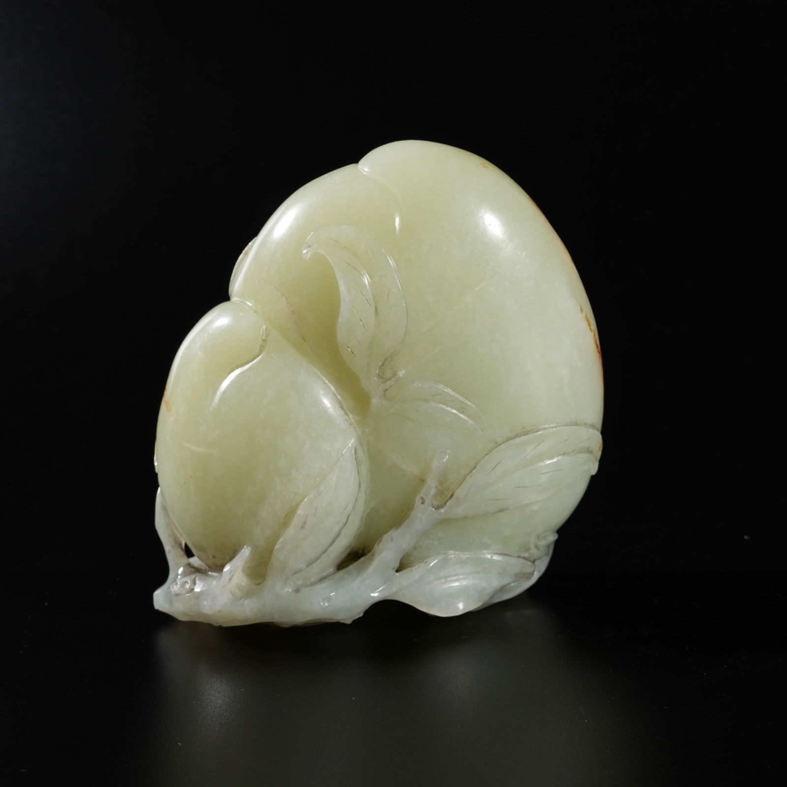 A HETIAN JADE CARVED PEACH-FORM ORNAMENT (1 of 9)