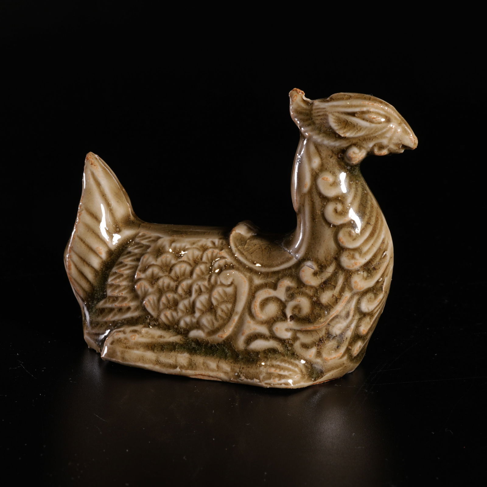 A YAOZHOU WARE PHOENIX-FORM DISPLAY PIECE: Yaozhou ware phoenix-form display piece