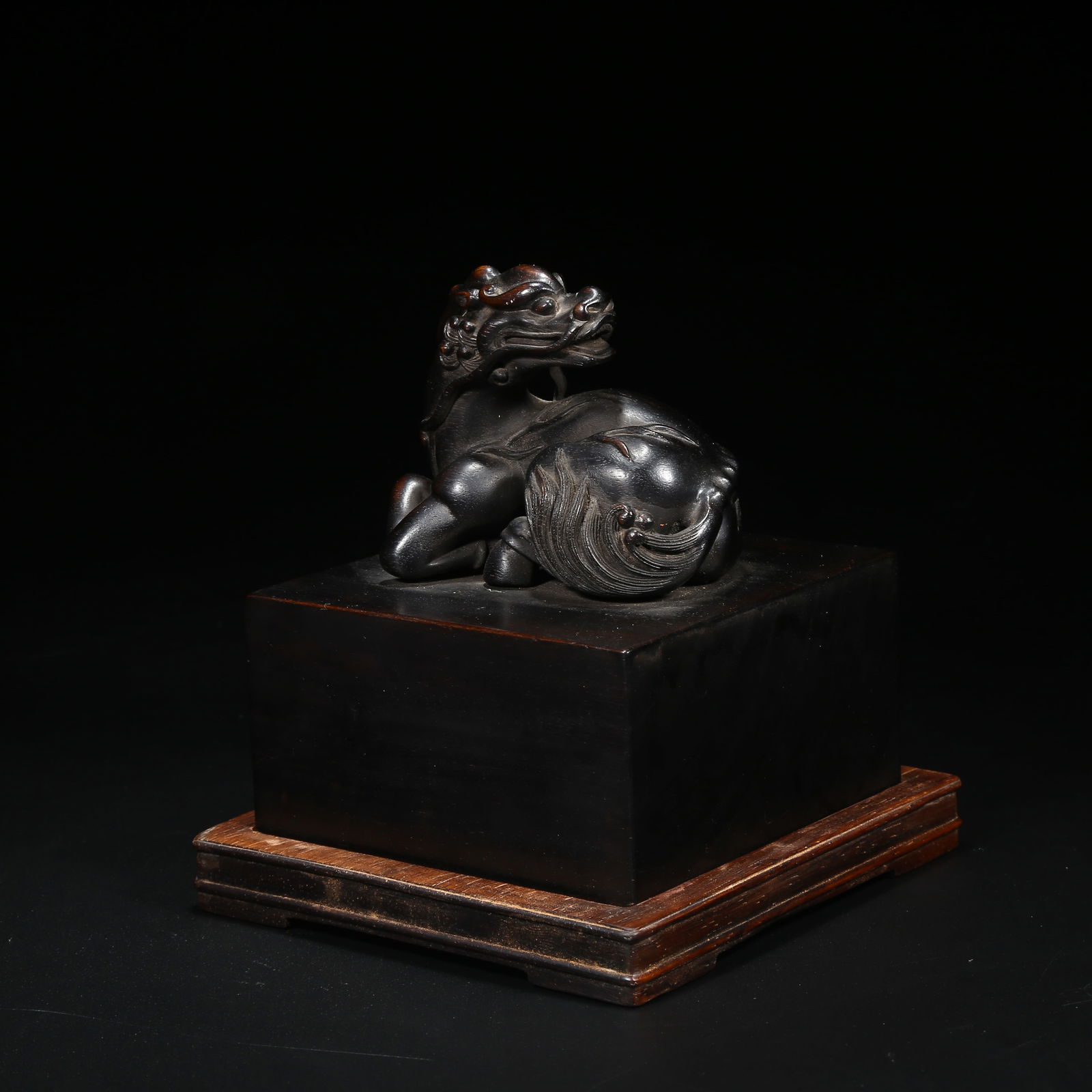 A ZITAN SEAL WITH QILIN-SHAPED KNOB: Zitan seal with qilin-shaped knob