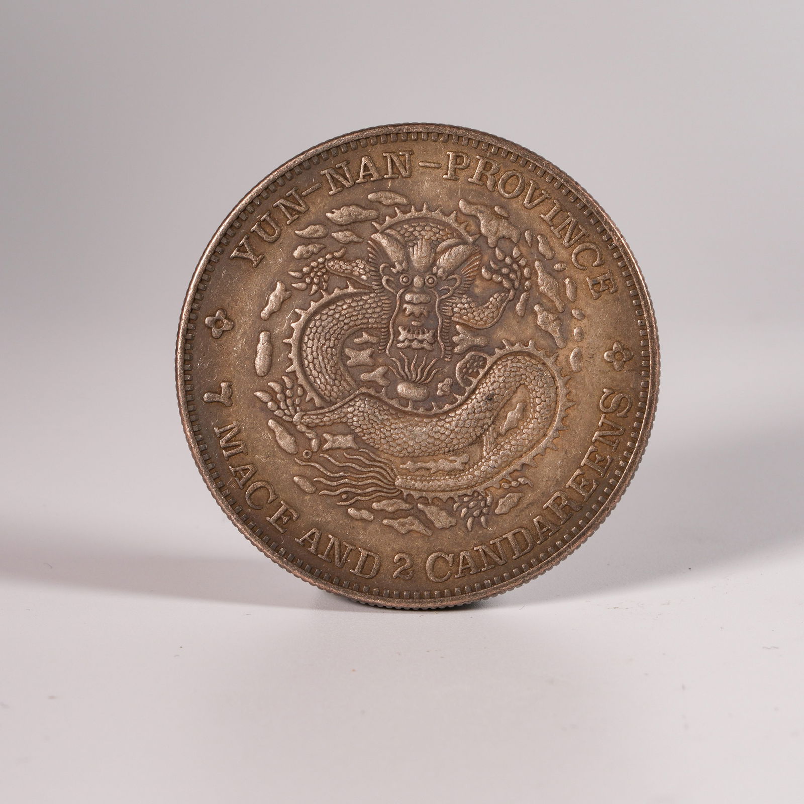 A SILVER DOLLAR COIN - 3