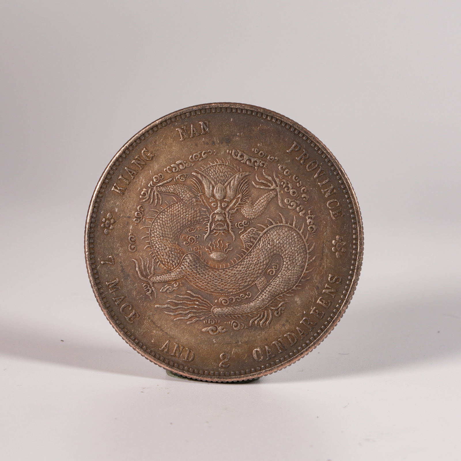 A SILVER DOLLAR COIN - 3