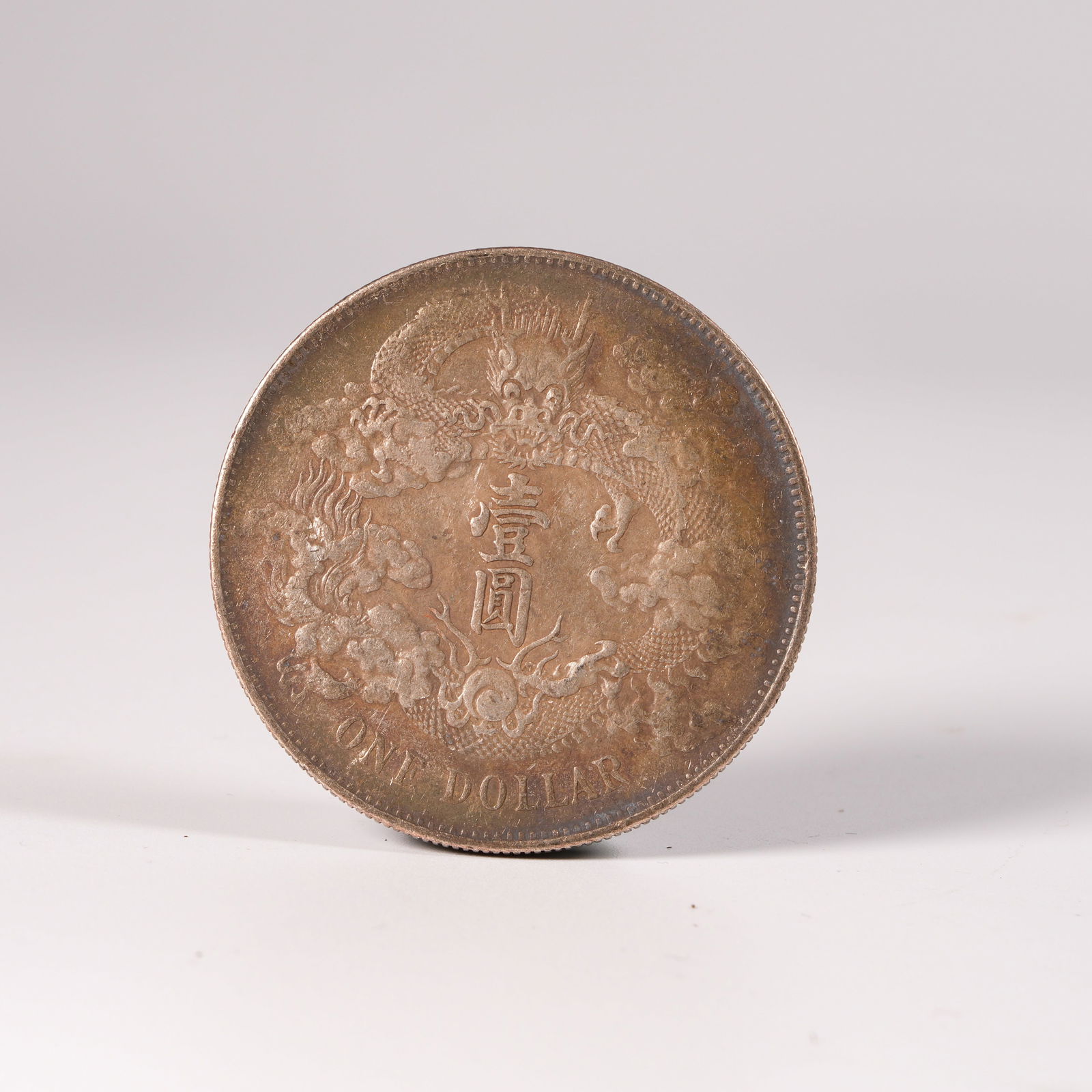 A SILVER DOLLAR COIN - 3