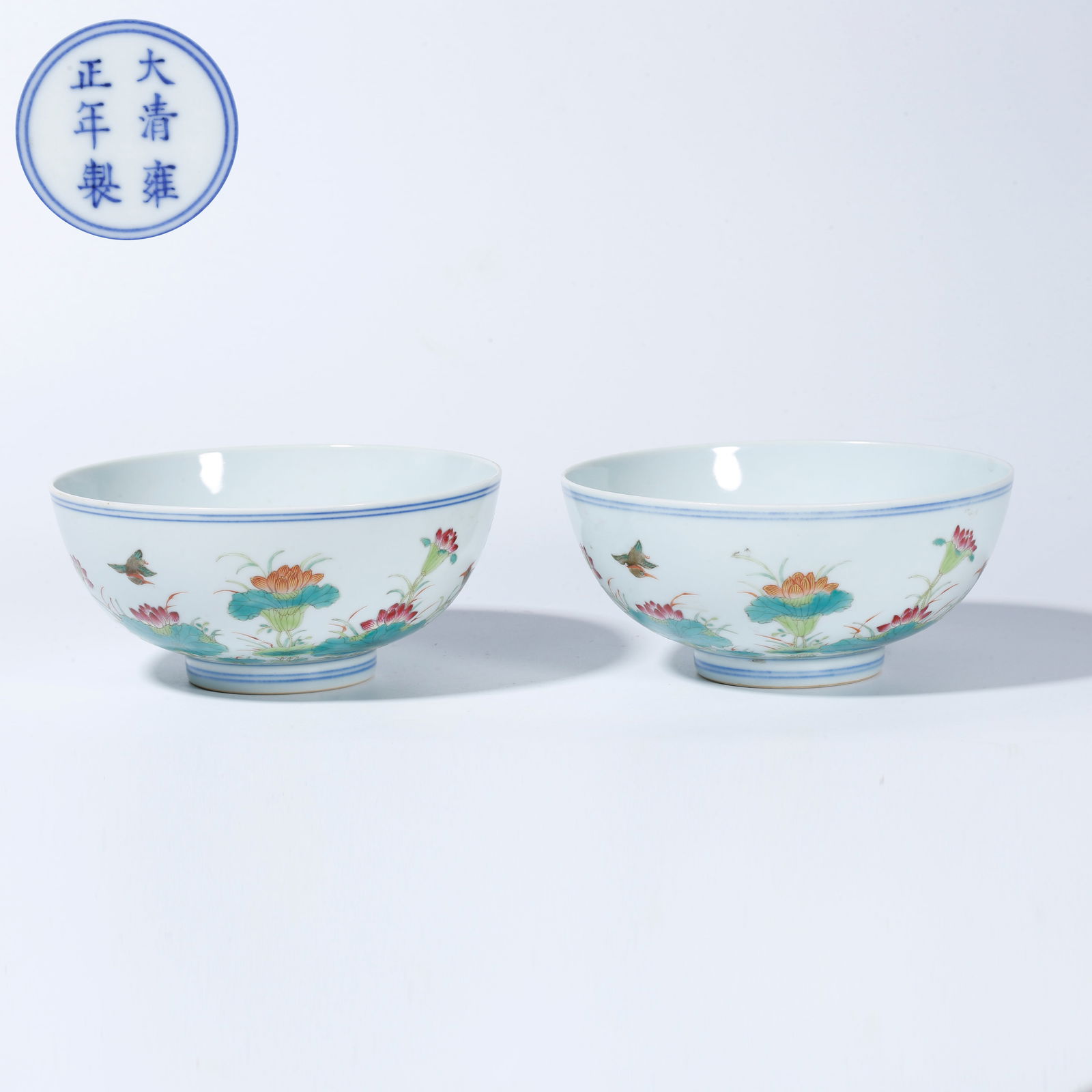 A FAMILLE ROSE FLOWER-AND-BIRD BOWL (PAIR): Famille Rose Flower-and-Bird Bowl (Pair)