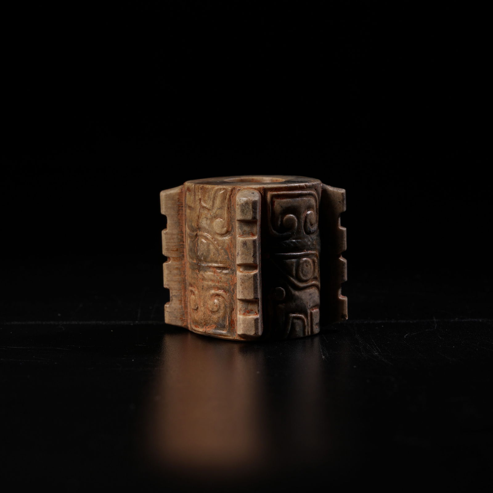 A ANCIENT JADE JIAHE CULTURE RITUAL BLADE WITH DEITY FACE MOTIF: Ancient Jade Jiahe Culture Ritual Blade with Deity Face Motif