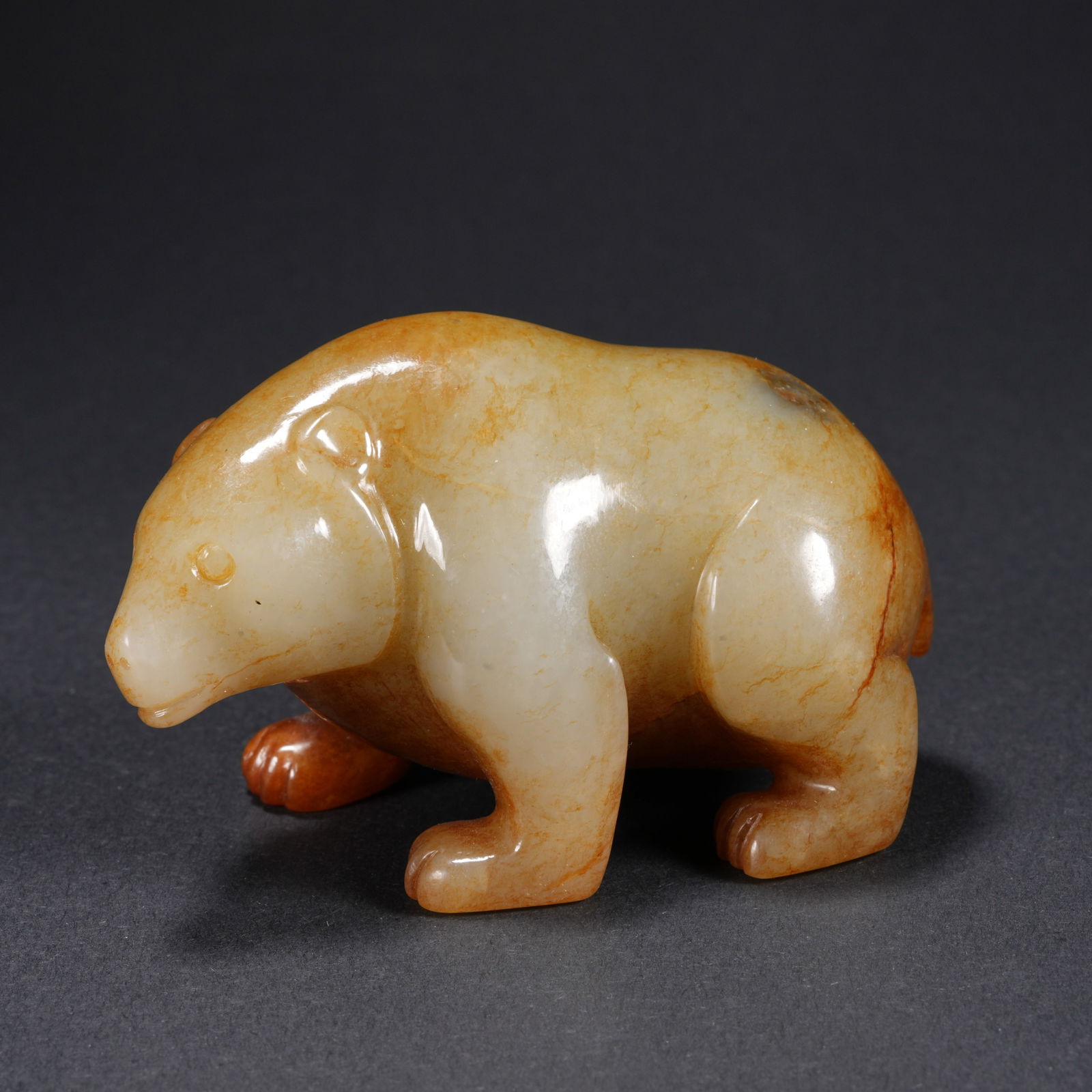 A HETIAN JADE CARVED BEAR FIGURE (1 of 10)