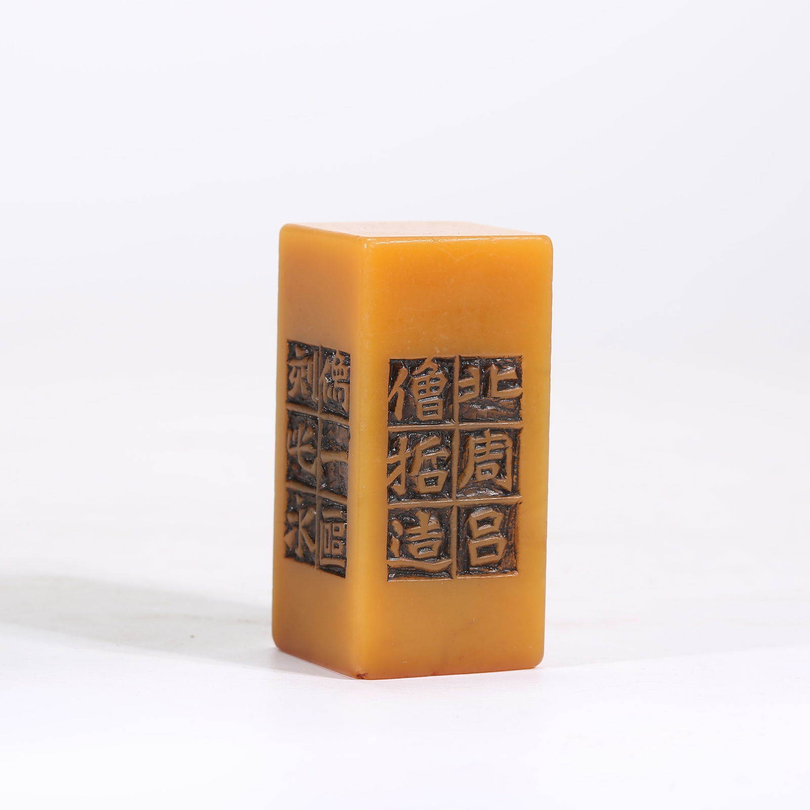 A SHOUSHAN TIANHUANG STONE SEAL ENGRAVED WITH POEM: Shoushan Tianhuang stone seal engraved with poem