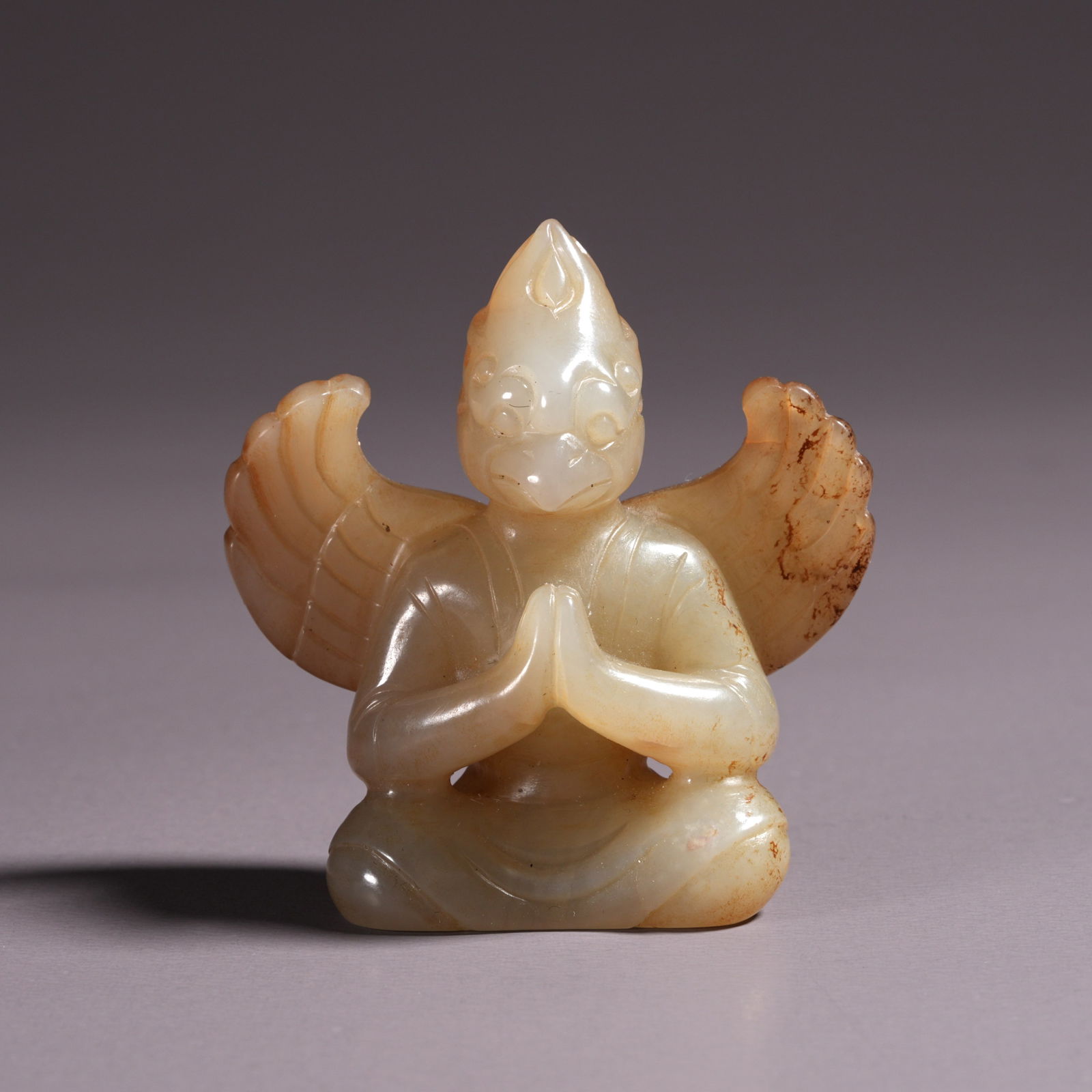 A HETIAN JADE CARVING OF A ROC BIRD ORNAMENT: Hetian Jade Carving of a Roc Bird Ornament