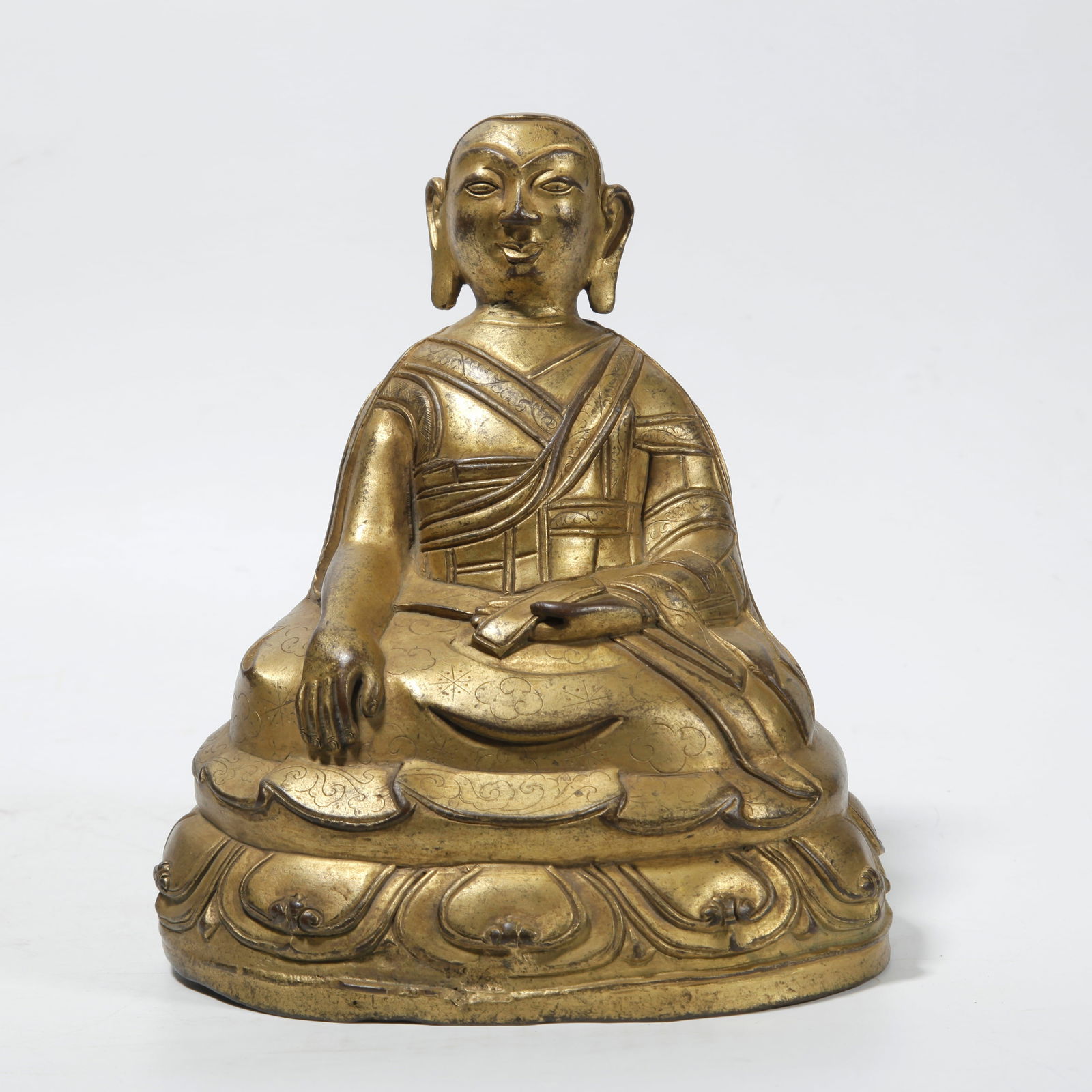 A GILT BRONZE LAMA STATUE: Gilt Bronze Lama Statue