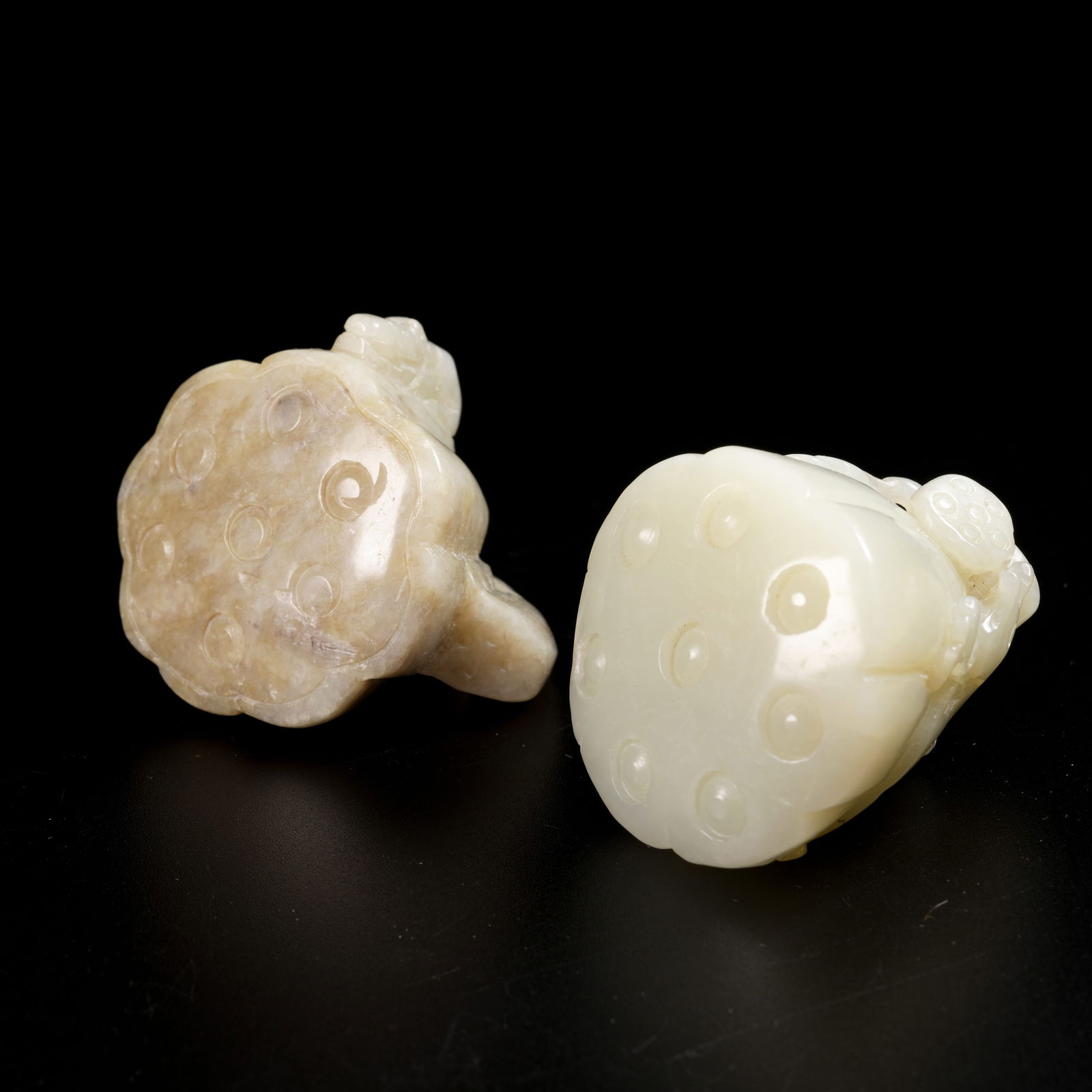 A SET OF HETIAN JADE LOTUS POD PENDANTS: Set of Hetian Jade Lotus Pod Pendants