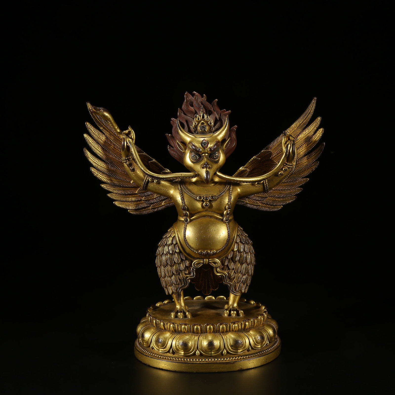 A GILT BRONZE STATUE OF A GREAT PENG WITH GOLDEN WINGS: Gilt Bronze Statue of a Great Peng with Golden Wings