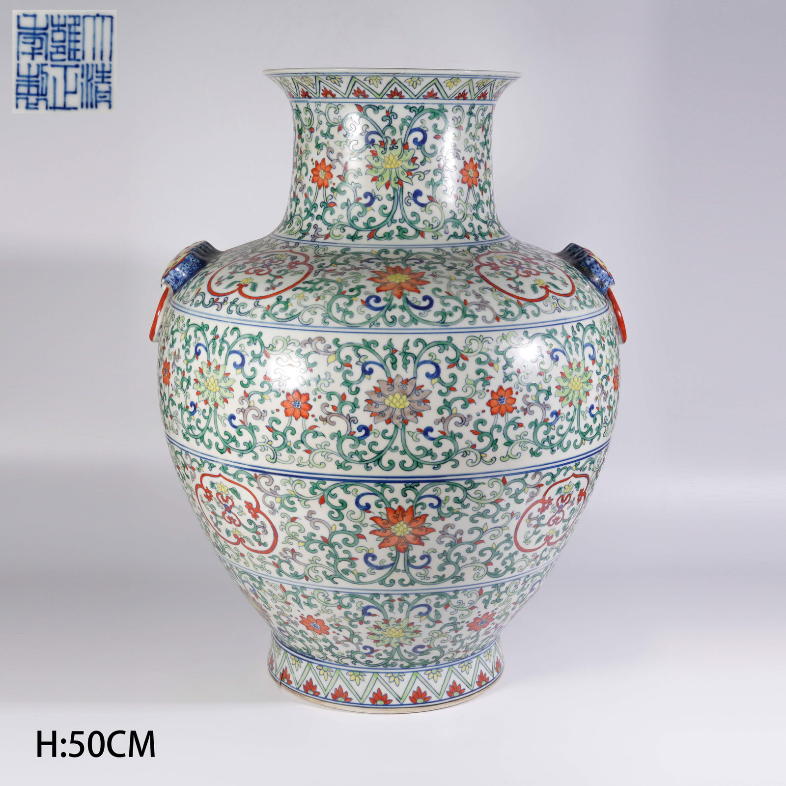 A DOUCAI FUSHOU ZUN VASE WITH INTERLACED FLORAL SCROLLS: Doucai fushou zun vase with interlaced floral scrolls