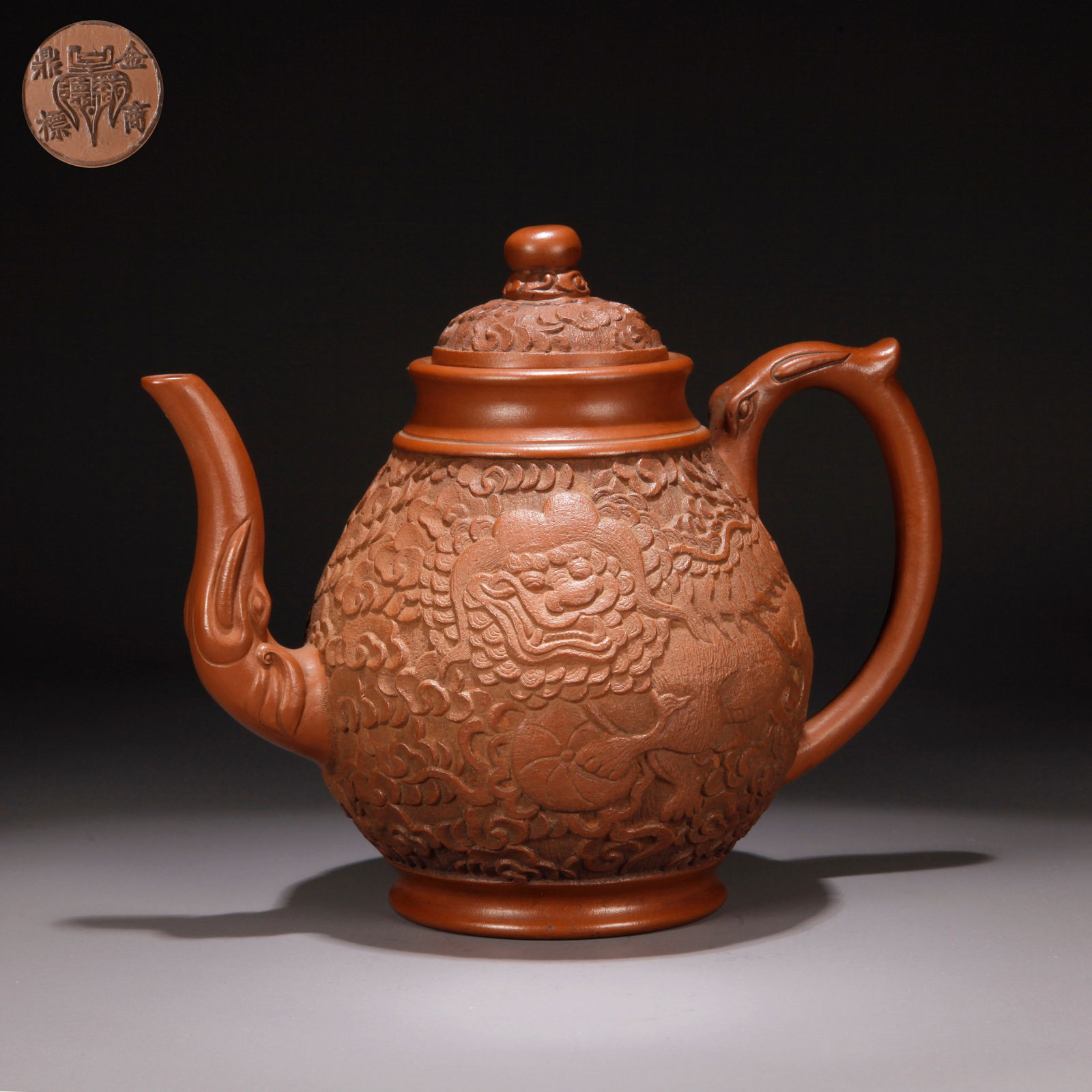 A ZISHA CLAY CARVED LION PLAYING WITH BALL PATTERN EWER: Zisha Clay Carved Lion Playing with Ball Pattern Ewer