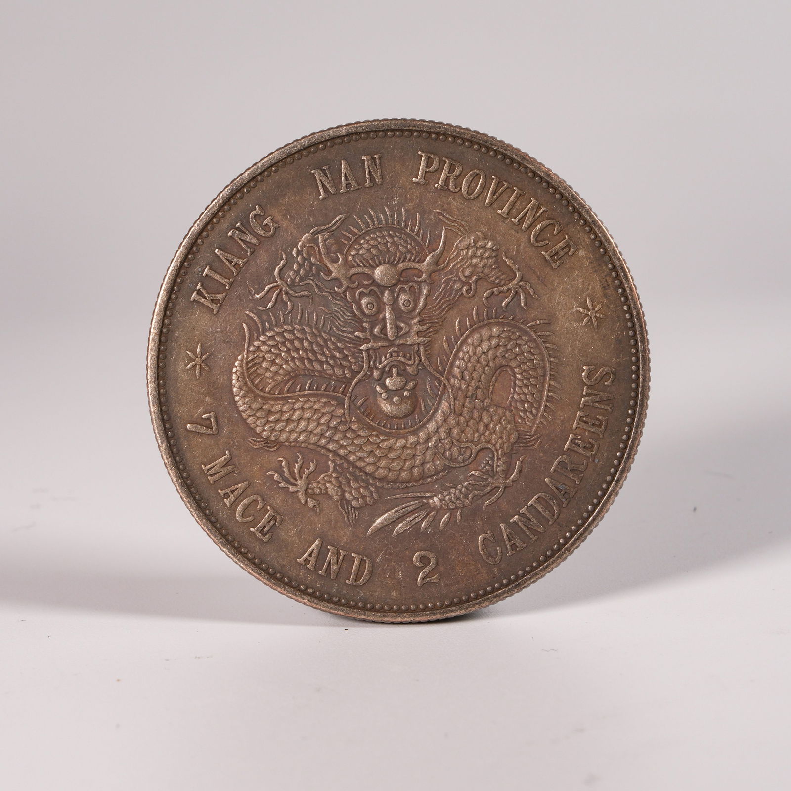 A SILVER DOLLAR COIN - 3