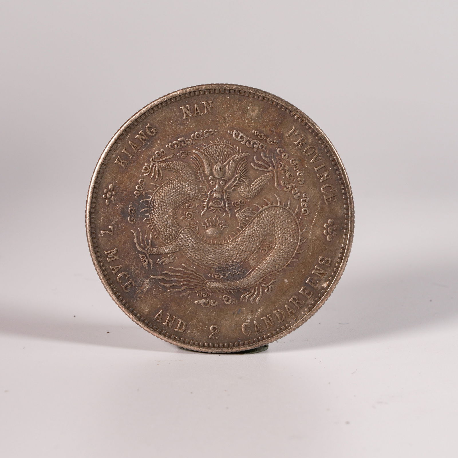 A SILVER DOLLAR COIN - 3