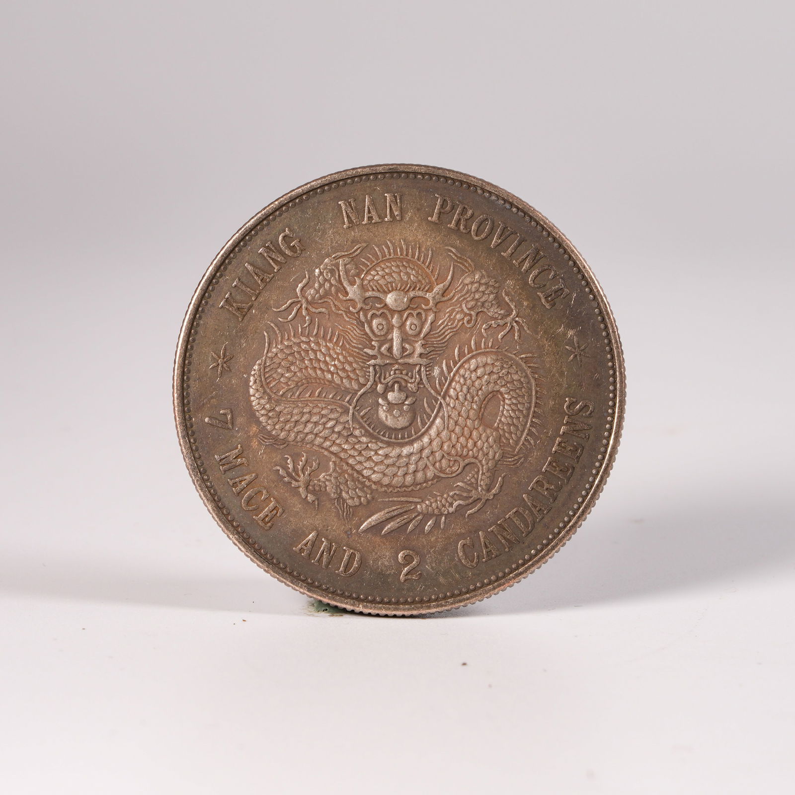 A SILVER DOLLAR COIN - 3