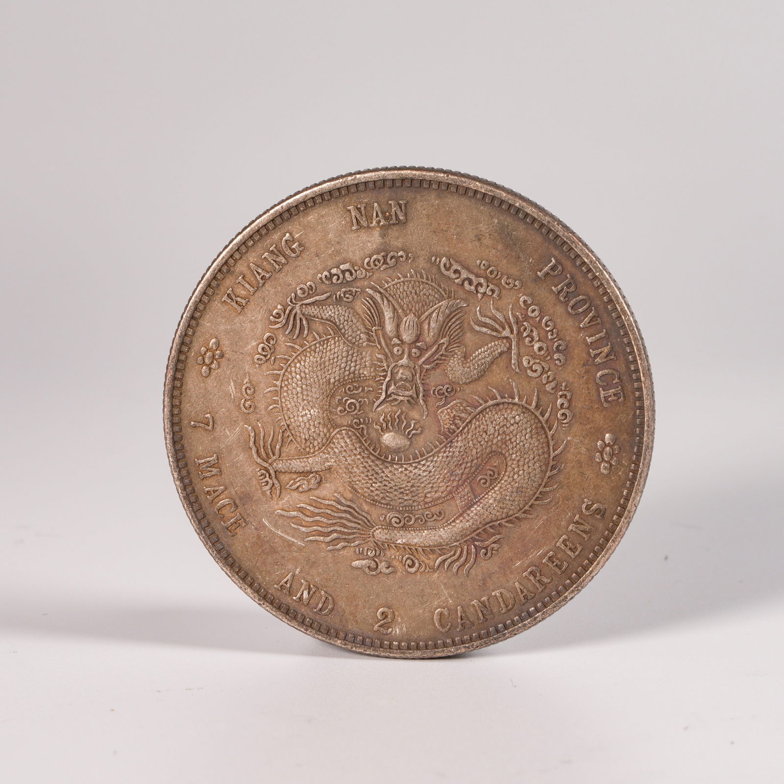 A SILVER DOLLAR COIN - 3