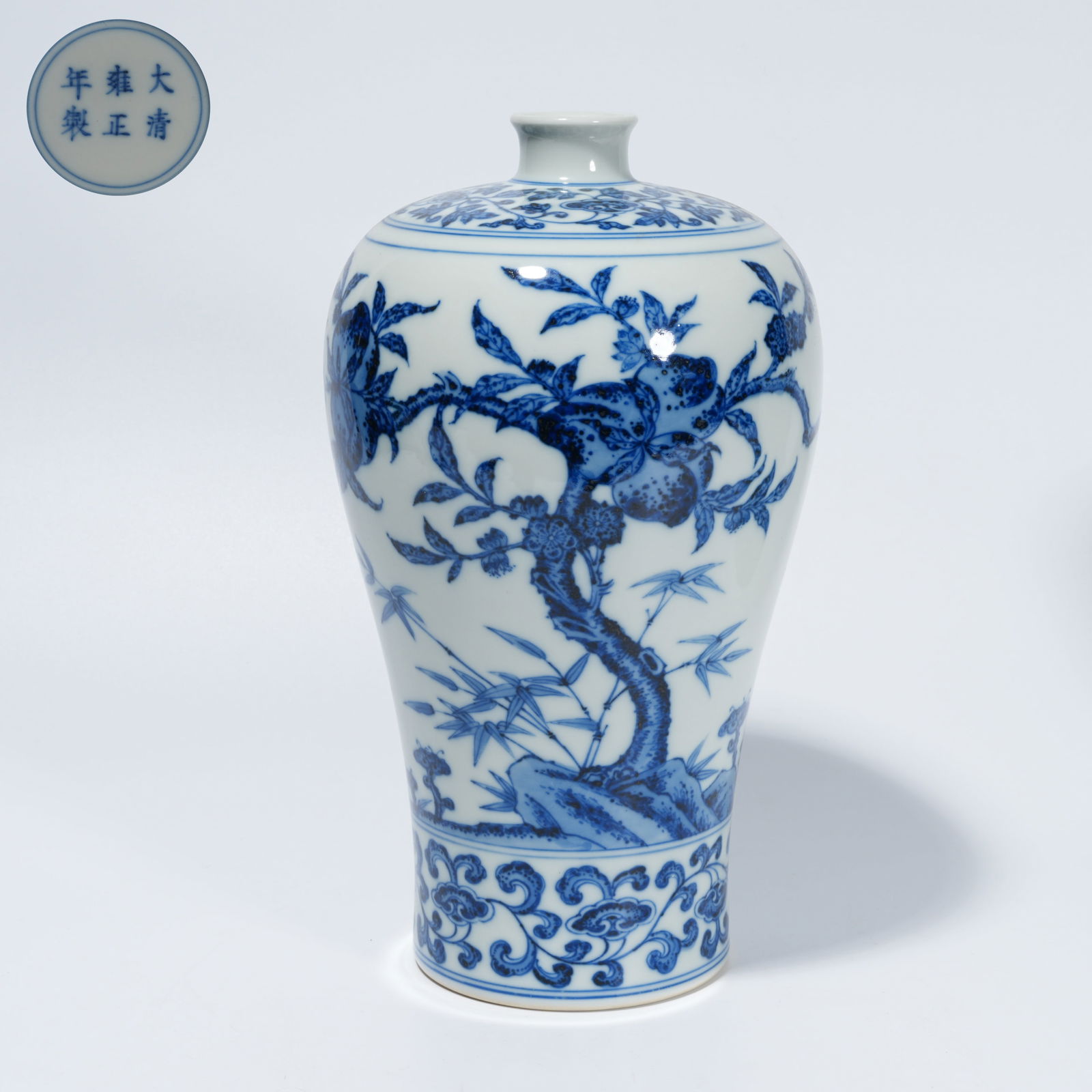 A BLUE-AND-WHITE PLUM VASE WITH LINGZHI AND LONGEVITY-PEACH MOTIF: Blue-and-White Plum Vase with Lingzhi and Longevity-Peach Motif