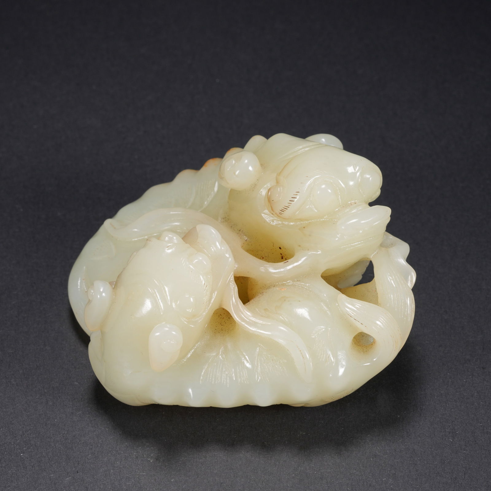 A HETIAN JADE CARVED LARGE AND SMALL LION FIGURES (1 of 9)