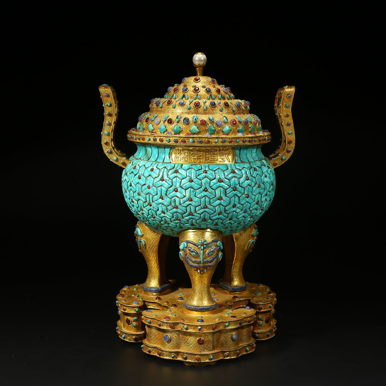 A GILT BRONZE THREE-LEGGED INCENSE BURNER WITH CROWN AND INLAID GEMSTONES: Gilt bronze three-legged incense burner with crown and inlaid gemstones