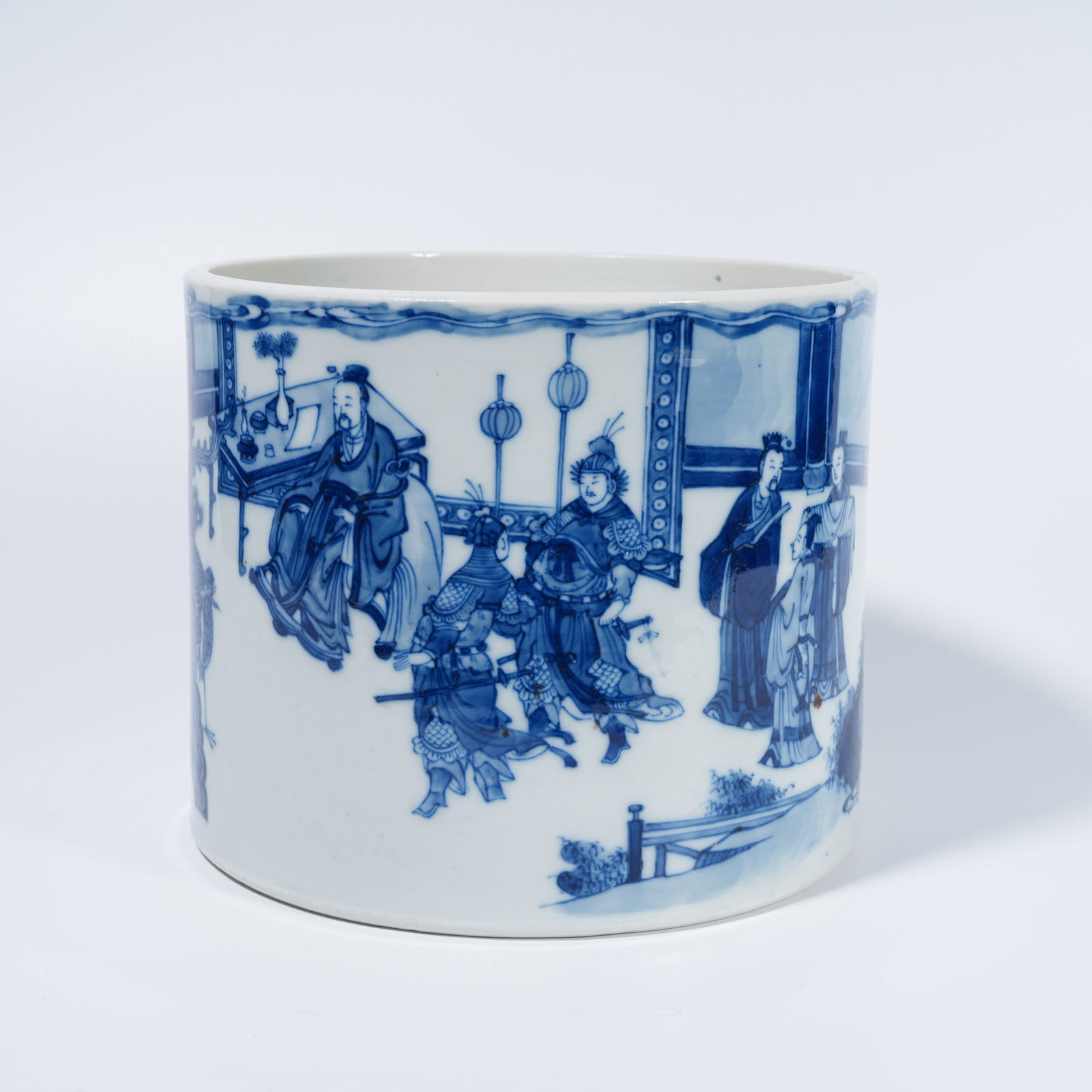 A BLUE-AND-WHITE BRUSH POT WITH FIGURAL NARRATIVE MOTIF: Blue-and-White Brush Pot with Figural Narrative Motif