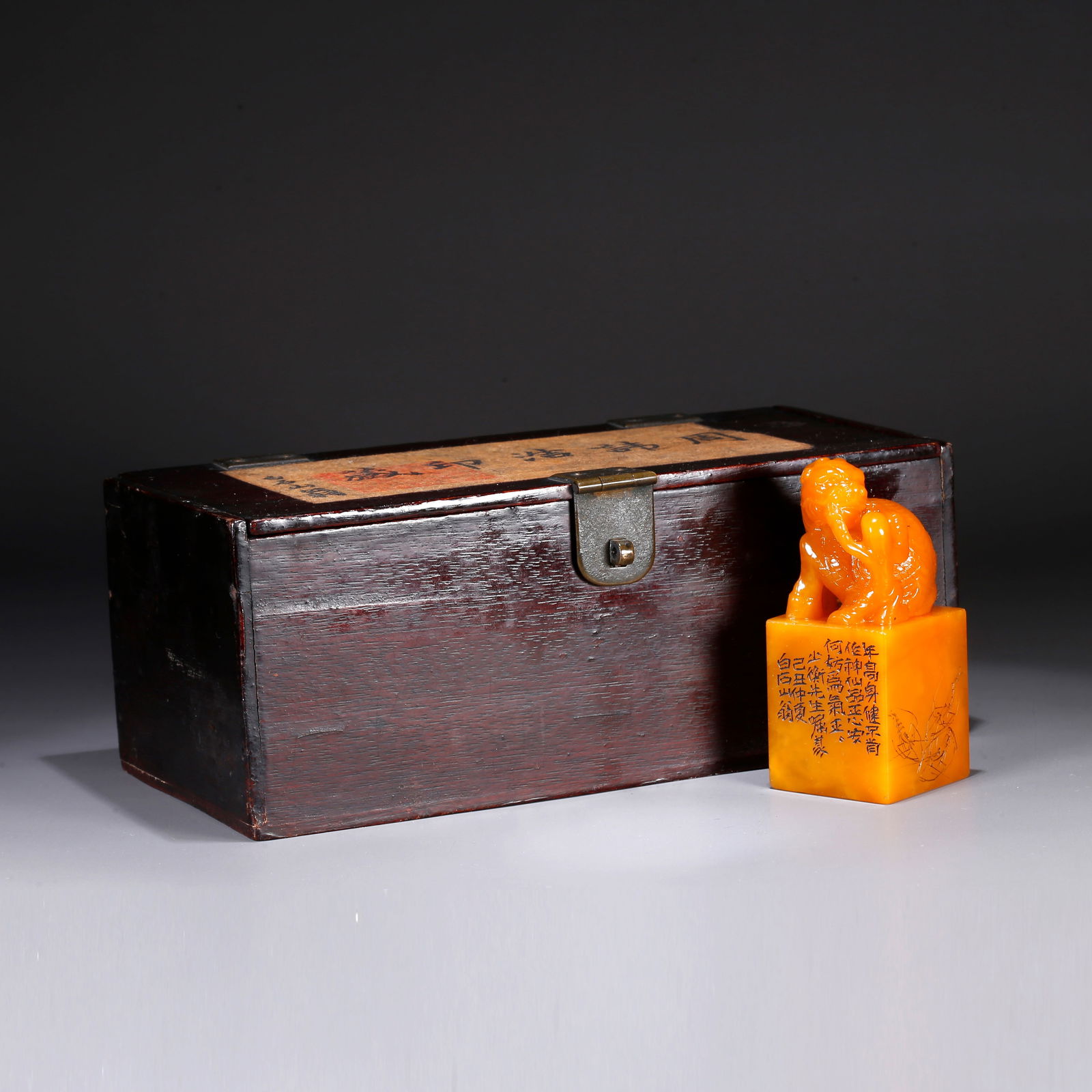 A SHOUSHAN TIANHUANG STONE SEAL WITH LION KNOB: Shoushan Tianhuang stone seal with lion knob