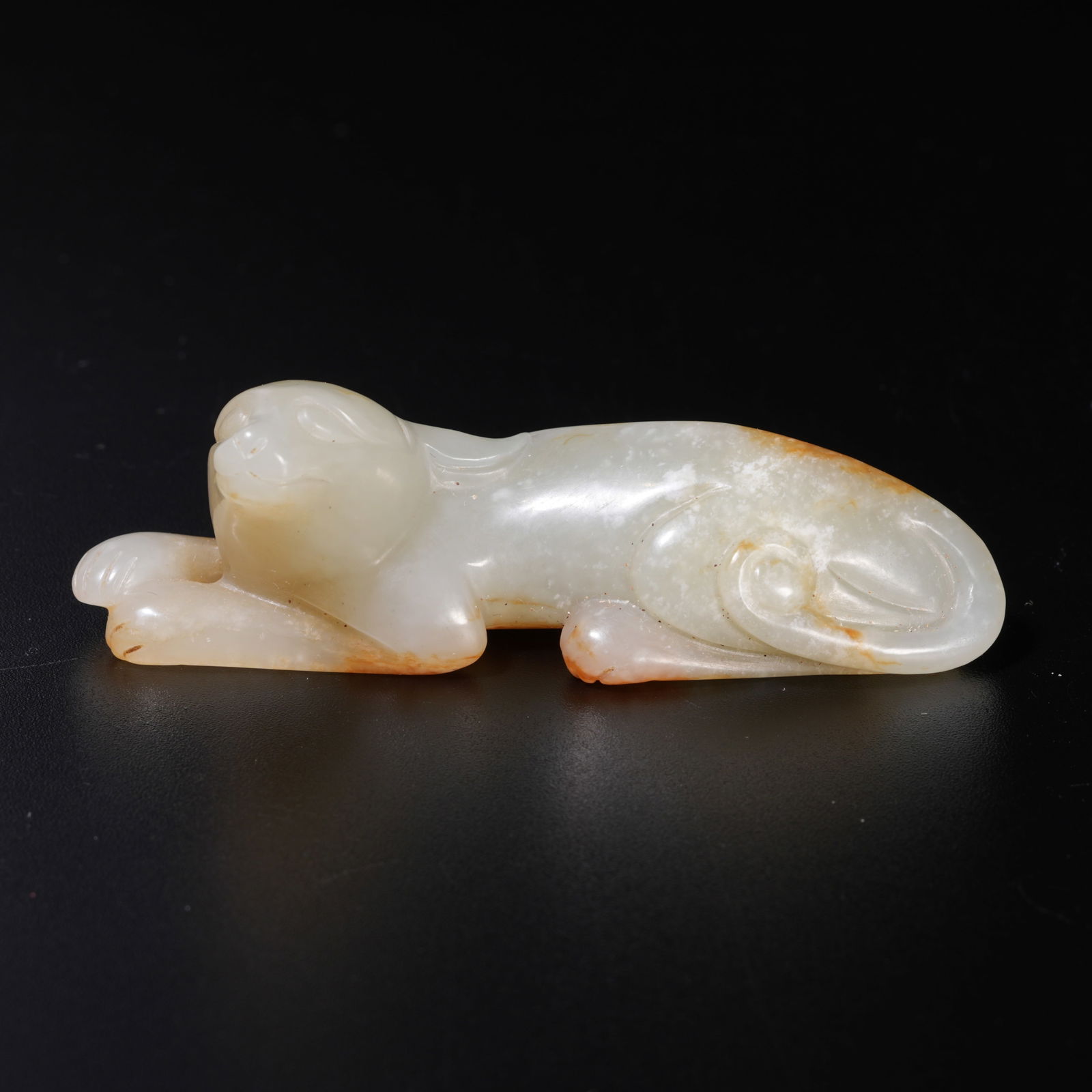 A HETIAN JADE CARVED DOG-SHAPED ORNAMENT (1 of 10)