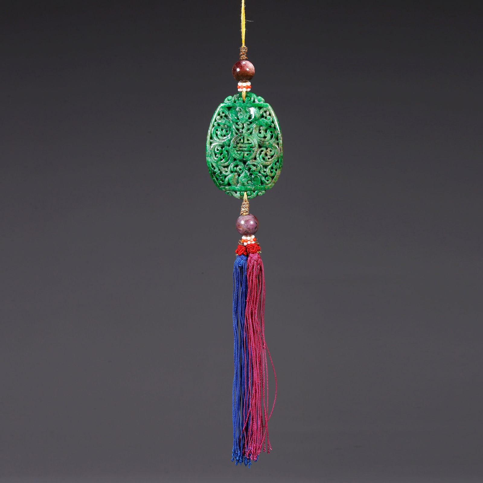 A JADEITE CARVED PENDANT (1 of 9)