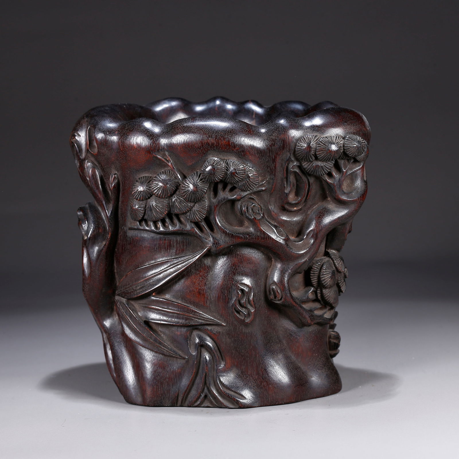 A ZITAN WOOD CARVING OF A PLUM BLOSSOM-PATTERNED BRUSH POT (1 of 10)