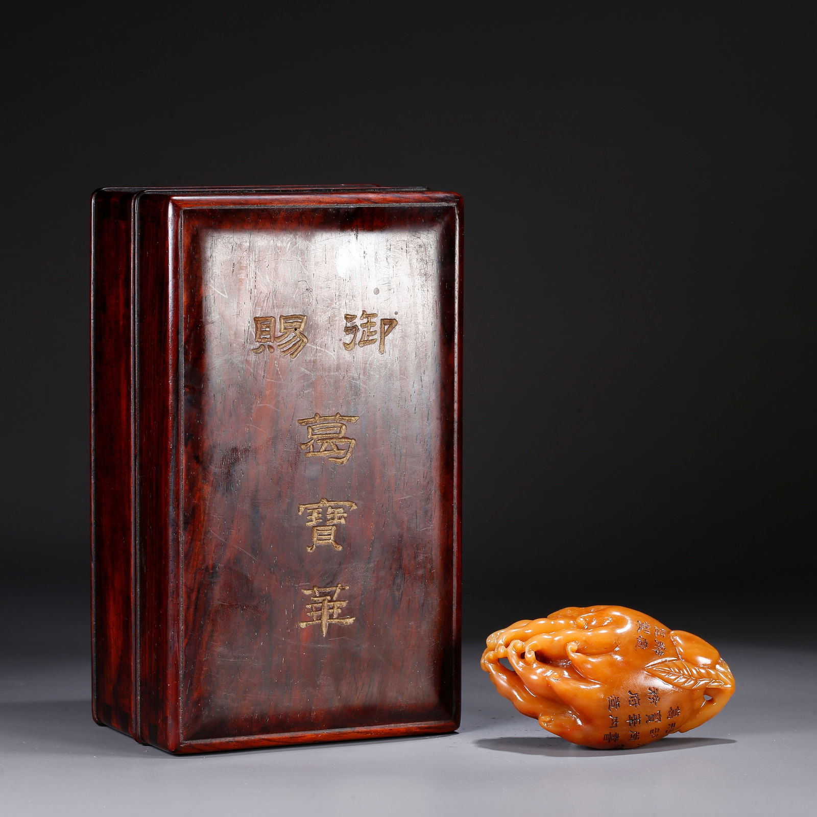 A SHOUSHAN TIANHUANG STONE HANDHELD ORNAMENT CARVED IN BUDDHA’S HAND FRUIT FORM: Shoushan Tianhuang stone handheld ornament carved in Buddha’s hand fruit form